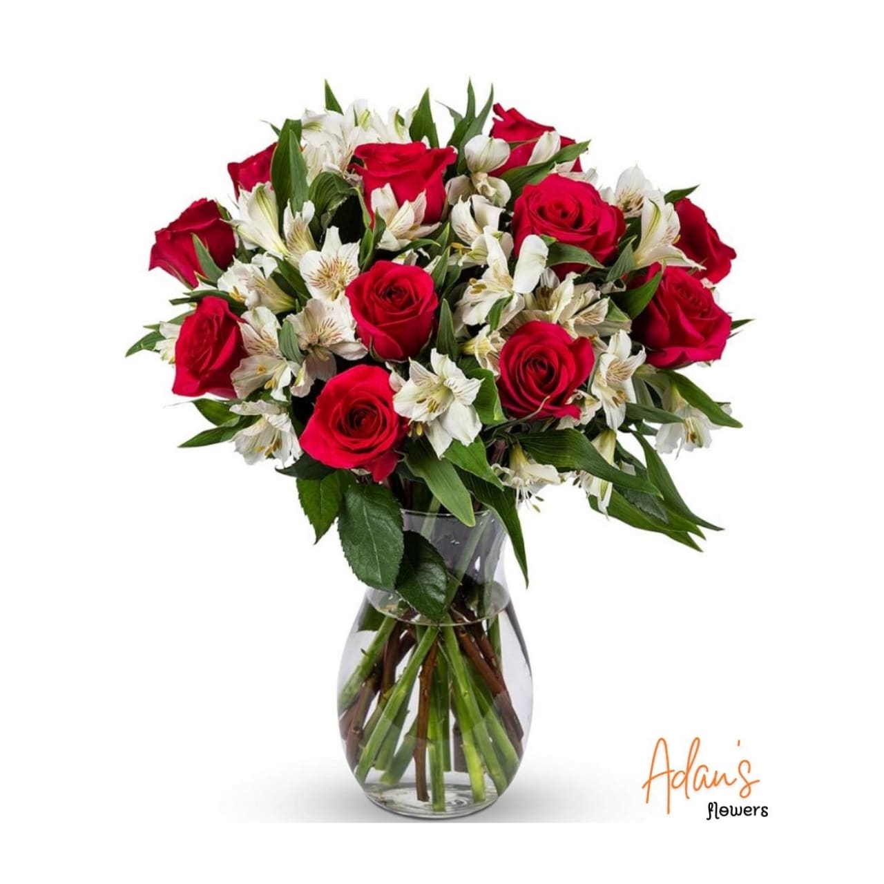Smile - Beautiful floral arrangement showcased in a clear crystal vase, featuring an exquisite mix of fresh flowers artfully arranged to add charm, color, and refined elegance to any setting.