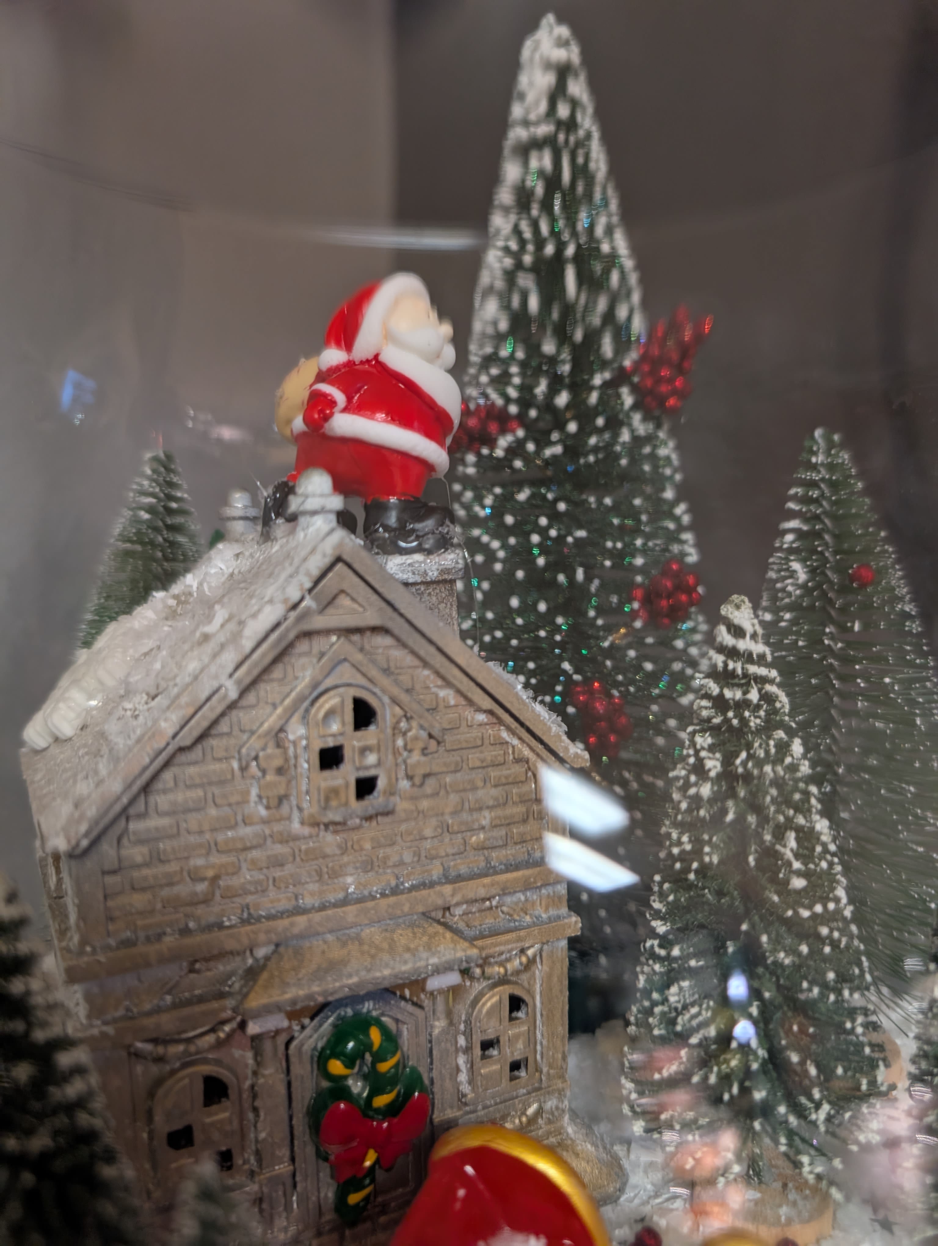 Pk Holiday Decor Santa's delivery  - This adorable little hime inside a glass base is decorated perfectly for the holiday season. Complete with Santa going down the chimney, his sleigh and Rudolph surrounded by winter evergreens and winter snow. A perfect addition to your holiday decor