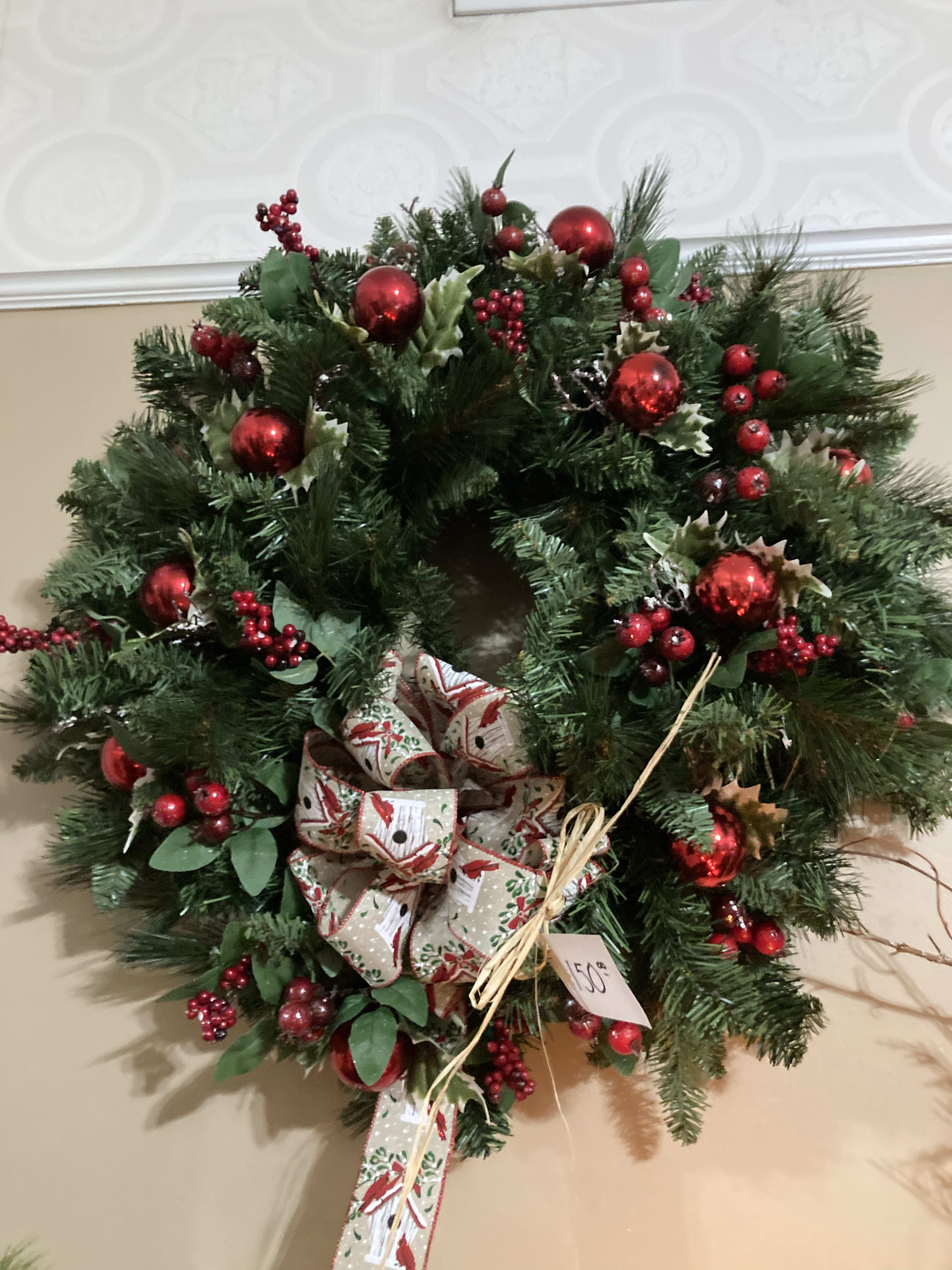 Red Christmas Berry Wreath - This oversized Christmas wreath screams a traditional Christmas. Red berries, ornaments and a trendy redbird ribbon.