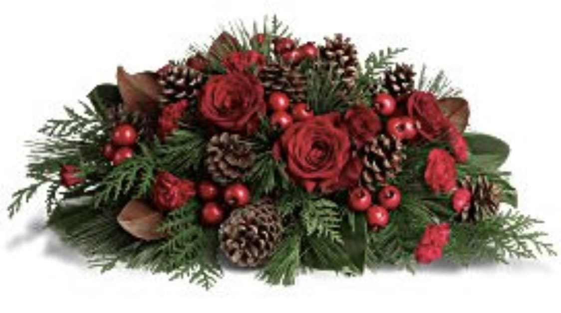 ‘‘Tis the Season”  - Bright with Red Roses, berries, pine cones, evergreens &amp; magnolia leaves. Substitutions may be needed based on availability. Truly a traditional  Christmas centerpiece To liven up any holiday home and celebration. Please contact us directly for any special requests, questions or concerns. 
