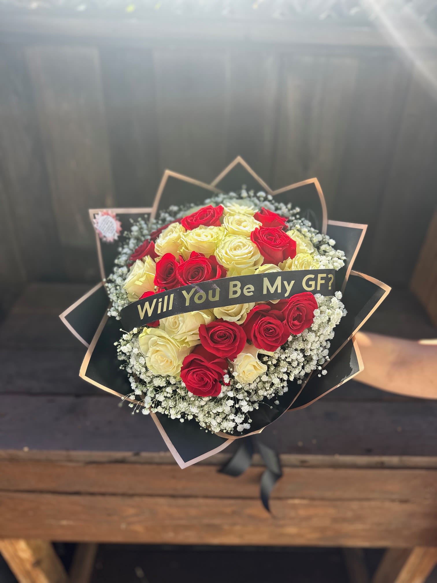 25 Mix Red &amp; White Roses Boquet with Custom Ribbon by Pretty Petals Arrangements  - At Pretty Petals Arrangements, we are dedicated to delivering floral artistry that speaks volumes. Our exquisite bouquet of 25 mixed red and white roses is a perfect embodiment of grace and sophistication. This elegant arrangement showcases the vibrant contrast of deep red and pure white roses, each carefully selected for their exceptional quality and beauty. Our expert florists meticulously craft each bouquet, ensuring that every rose is positioned to highlight its natural elegance. The result is a stunning presentation that will make any special moment even more memorable. When you choose our 25 mixed red and white roses, you are selecting a gift that stands out for its beauty and meaning. Let Pretty Petals Arrangements help you make an unforgettable impression with a bouquet that truly reflects your sentiments.