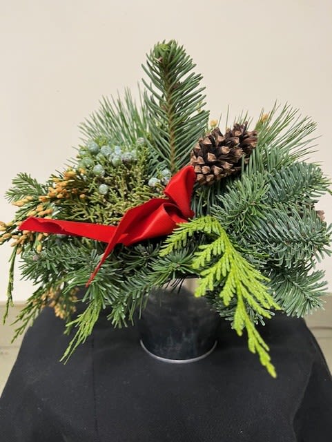 Jolly Holiday Bouquet - A shiny tin container with fresh balsam fir, white pine, and Port Orford cedar.  Trimmed with spruce cones and a festive holiday ribbon!  (Local pickup or delivery only)