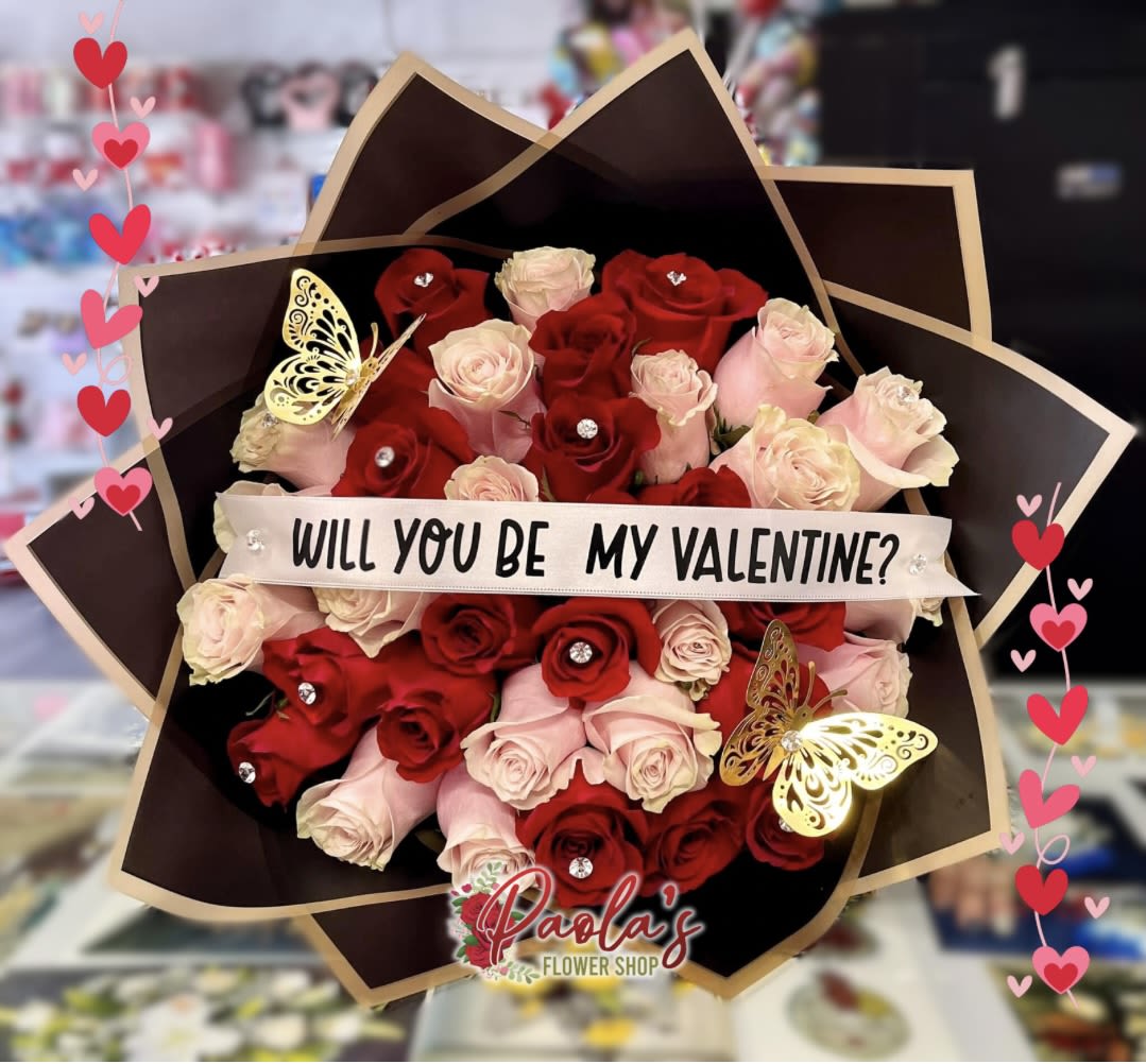 Pink and red rose buchon  -  Sweep them off their feet this year with one of these 36 blooming fabulous rose count buchones!  *For Mother’s day the ribbon will display “Happy Mother’s Day!”  For Valentine’s Day the ribbon will display “Happy Valentine’s Day!”   Can be customized, just be sure to add on the notes for florist section at checkout. 