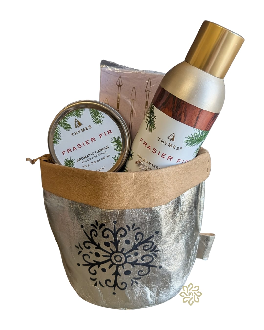 Frasier Fir Holiday Glow Gift Set - Bring the crisp, cozy scent of the holidays into any home with our Frasier Fir Holiday Glow Gift Set. Thoughtfully curated for fragrance lovers and holiday hosts, this elegant gift set features:  -Thymes Frasier Fir Room Mist – Instantly refresh any space with the iconic fragrance of fresh-cut fir trees, snow-kissed evergreens, and subtle citrus.  -Thymes Frasier Fir Mini Tin Candle – A petite yet powerful candle that fills the room with a warm, woodsy glow—perfect for mantels, bedside tables, or festive centerpieces.  -Decorative Matchbox – Stylish, easy-to-strike matches that add a charming touch to any coffee table or guest bathroom.  -Reusable, Washable Gold Snowflake Bag – A luxe, fabric cardboard gift bag adorned with shimmering gold snowflakes. Beautiful enough to gift as-is and durable enough to reuse for holiday décor, storage, or regifting.  This holiday fragrance gift set is ideal as a hostess gift, Christmas gift, teacher gift, client thank-you, or winter birthday present. Pair it with fresh flowers or a seasonal arrangement for a complete blooming gift bundle that delights both the eyes and the senses.