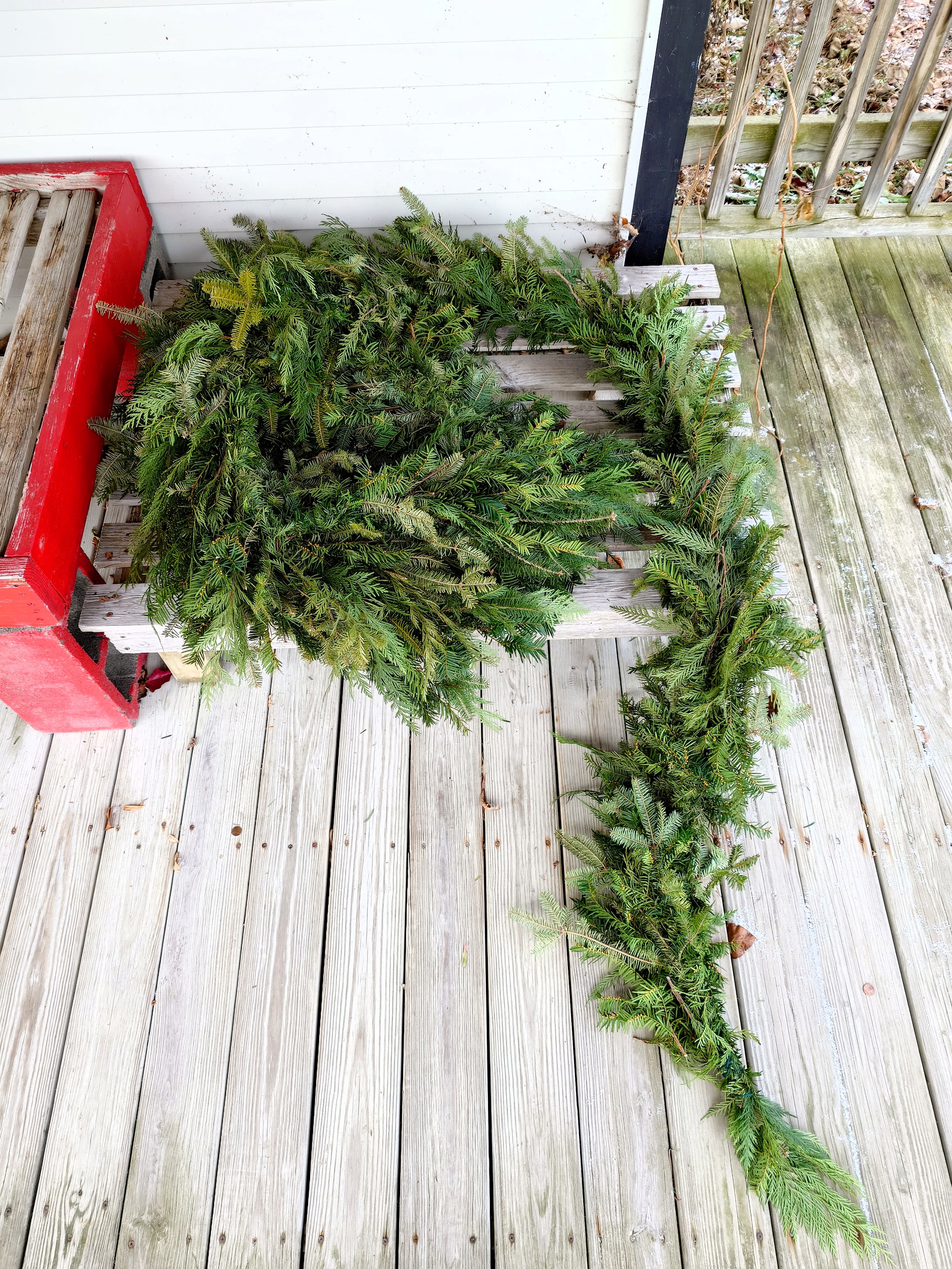 Fresh Mixed Evergreen Garland - Our handcrafted evergreen garland is made fresh to order using a seasonal blend of winter greens, including white pine, Fraser fir, incense cedar, western cedar, Carolina sapphire, and boxwood. Each strand is lush, fragrant, and full, perfect for mantels, staircases, railings, doorways, and holiday tables.  Garland is made fresh in our greenhouse for maximum longevity. Looking for a specific look or fragrance? We are happy to customize your garland using specific greens upon request, subject to availability.  Ideal for classic holiday decorating with a natural Finger Lakes feel.