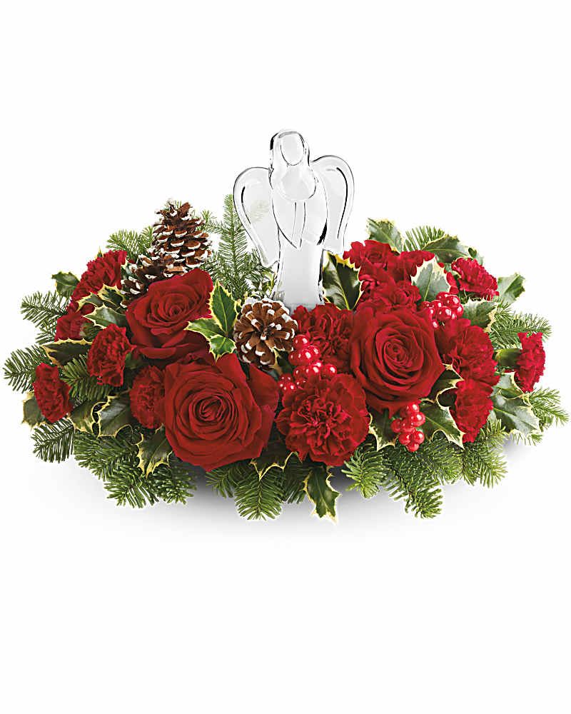 Evergreen Blooms Bouquet - This Evergreen Blooms Bouquet brings holiday warmth and grace with red roses, festive greenery, and a keepsake Crystal Angel. A meaningful gift for Christmas, remembrance, or spiritual celebrations.