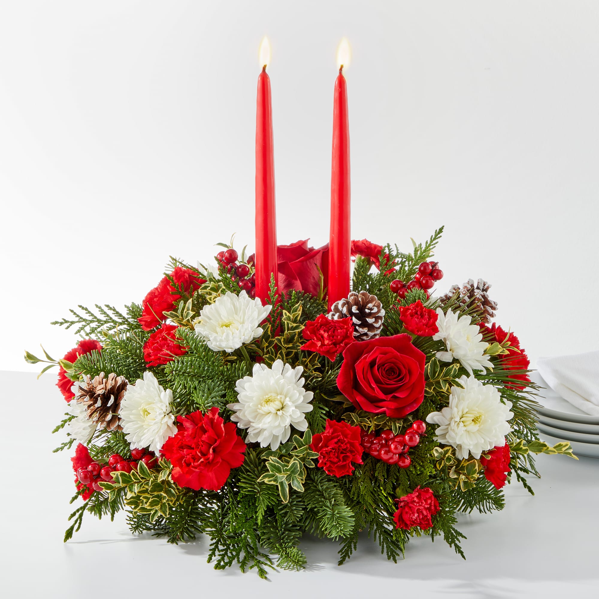 Holiday Soiree Centerpiece On Sale - Time to check decorations off the party checklist with our Holiday Soiree Centerpiece. This arrangement is perfect for all your seasonal events, whether you are hosting or sending ahead as a hosting gift. approximately 8"H x 15"W.