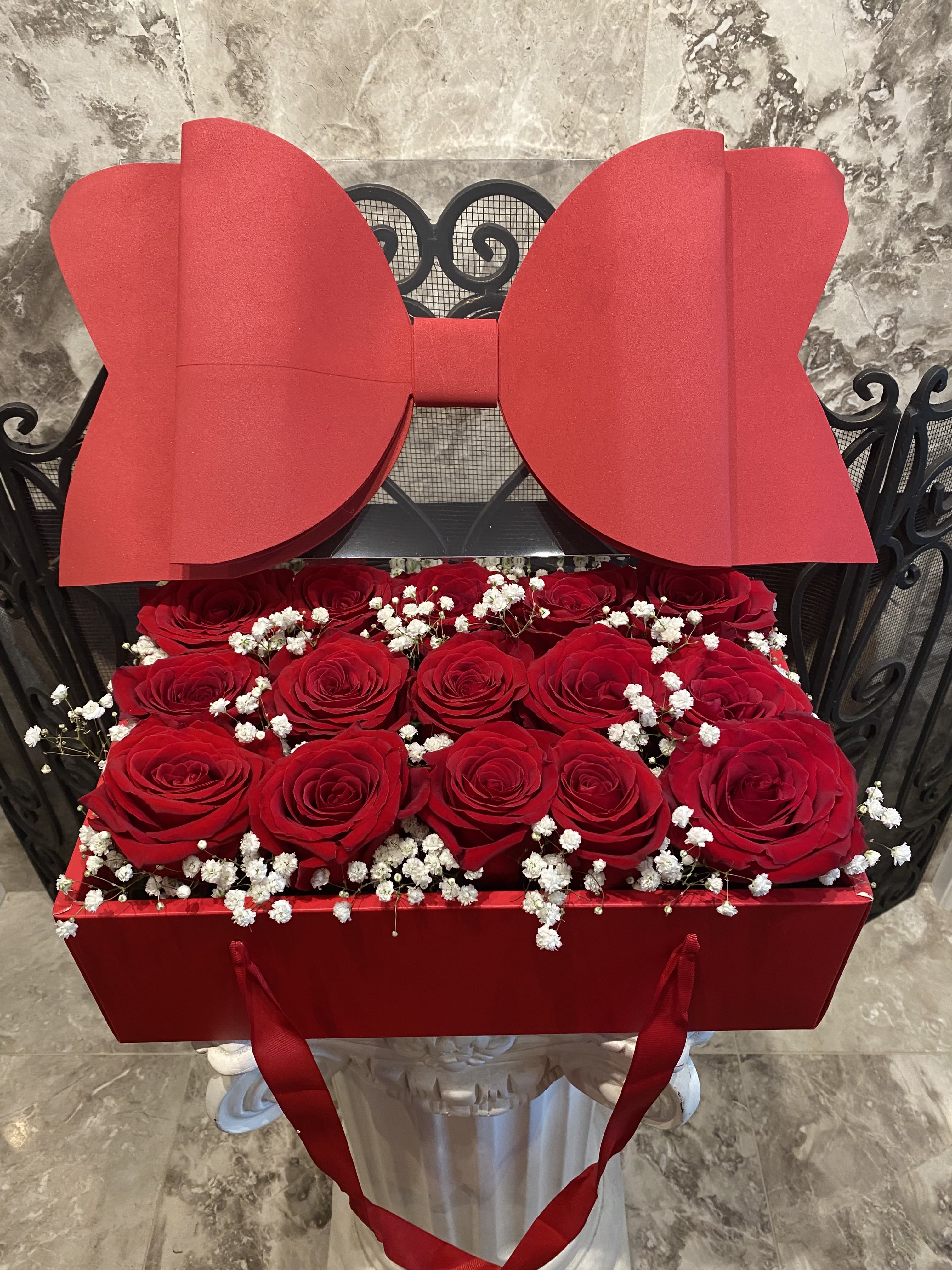 Popular Big Bow With Transparent Cover And Long Hand Carry Flower Box On Sale - 15 Fresh Cut Red Roses With Baby Breathe.  14''L x 8''W x 7'' H 