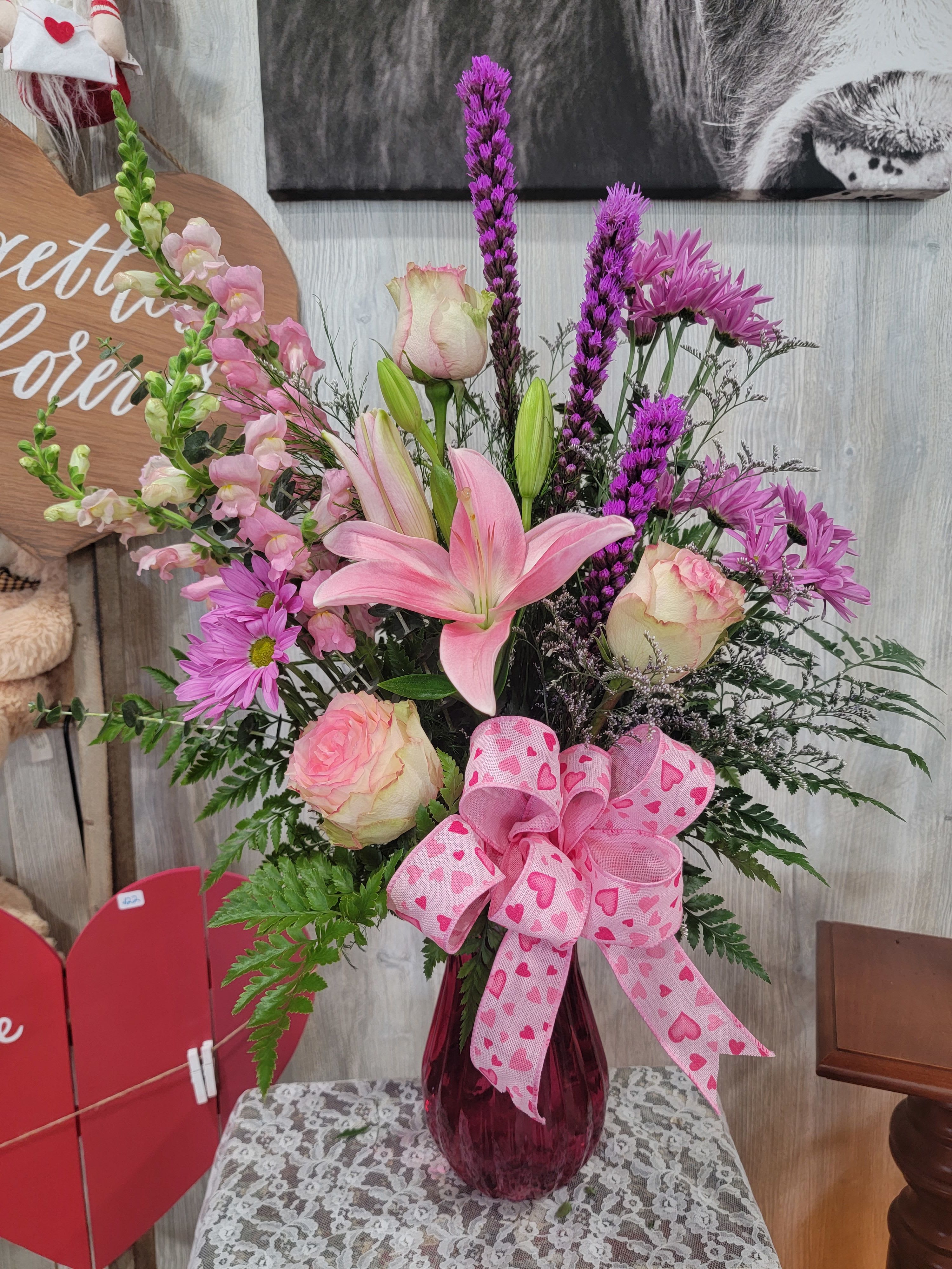 Pink Promise  - A beautiful vase arrangement full of a mixture pink blooms. Premium and deluxe pricing includes more flowers and fullness. 