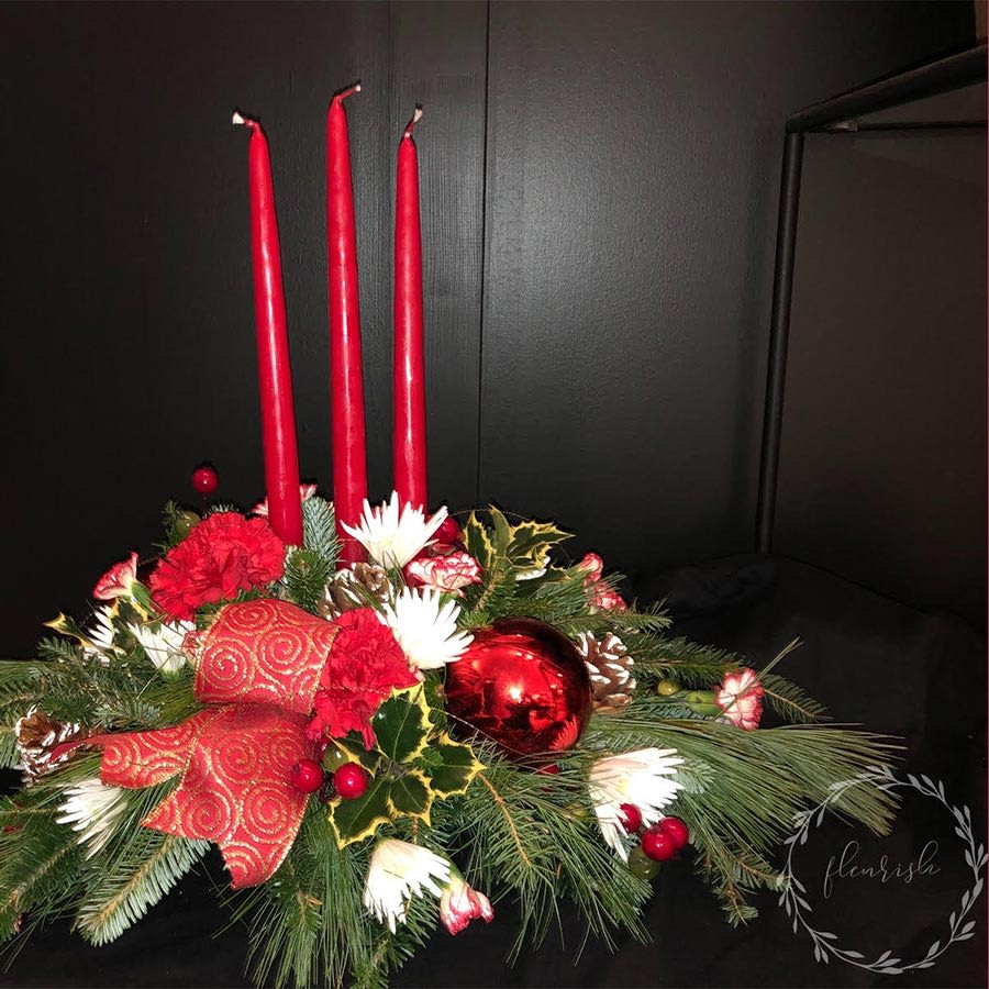 Holly Jolly - A traditional Christmas centrepiece with tapered candles or hurrincane and all the Christmas classics