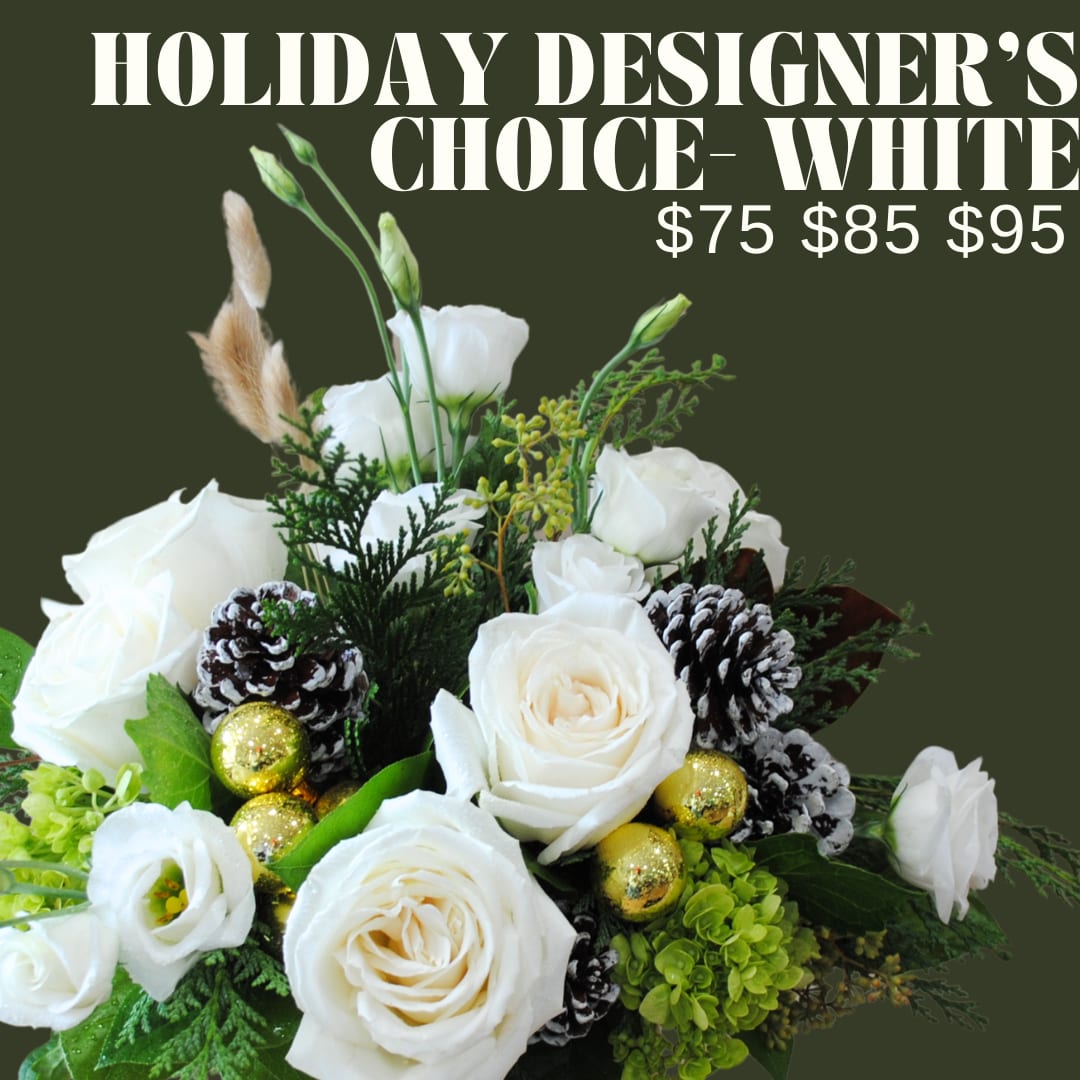 Holiday Designer's Choice White Winter Arrangement - A low and lush bouquet artfully designed in a vase or basket using white florals, and winter accents and greens!!  *Image shown is valued at $95 *The $75 and $85 price points will be made with fewer flowers to match the value using blooms in the same color palette