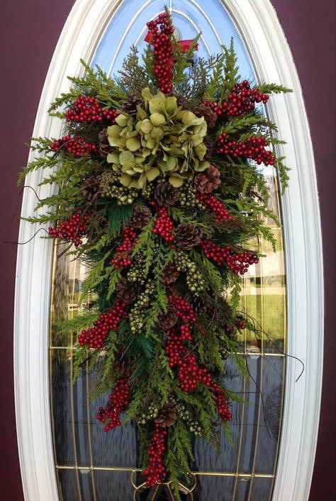 Holiday door swag - Holiday swag shaped door charm of evergreens, pinecones, berries, and fresh flowers and holiday trim with ribbon (customization available)
