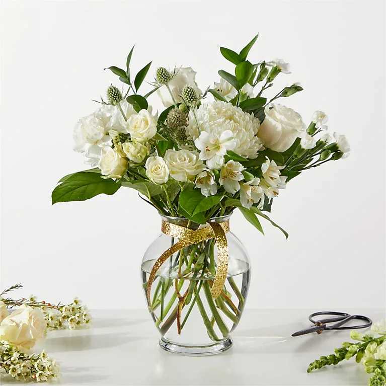 New Beginnings – A Florist Original - Write your resolutions beside a bouquet symbolizing the fresh start ahead. Our Florist Originals Bouquets are created by local florists using the finest quality flowers. The actual design you or your recipient will receive will be different from the images shown here. 