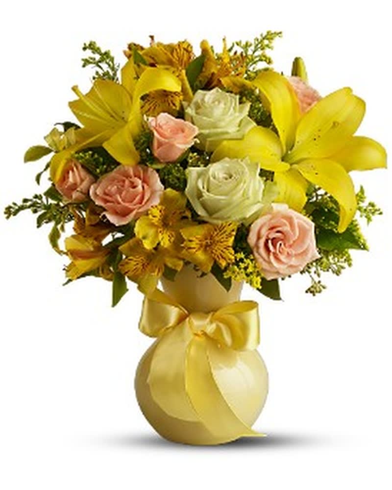 Sunny Smiles - If smiles were flowers, they'd look just like this. A cheery bouquet of yellow, peach and white blossoms is like a vase full of happiness! Add a matching yellow ribbon, and it becomes a bright day indeed. This lovely floral gift is an excellent "get well" choice, or just the right touch to perk up someone's spirits. An assortment of fresh flowers such as roses, Asiatic lilies and alstroemeria, in shades of green, peach and yellow, is delivered in a sweetheart vase decorated with a yellow ribbon. Approximately 11" (W) x 13" (H) Orientation: All-Around As Shown : TFWEB320