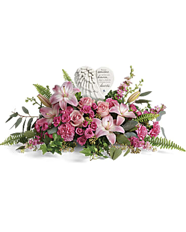 Heartfelt Farewell Bouquet - Say a heartfelt farewell to a loved one with this touching porcelain keepsake, nestled in a bouquet of the prettiest pink roses and lilies. This heartfelt bouquet includes pink roses, pink spray roses, pink asiatic lilies, pink carnations, pink larkspur, green ivy, seeded eucalyptus, silver dollar eucalyptus, and sword fern. 
