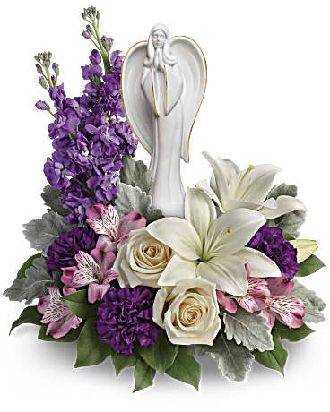 Beautiful Heart Bouquet - An elegantly unique expression of your deepest condolences, this majestic mix of crÃ¨me, white and lavender blooms includes fragrant roses and lilies to refresh and rejuvenate their spirits. Nestled among the blooms is a graceful angel sculpture - a serene, spiritual keepsake they'll always treasure. This beautiful arrangement includes crÃ¨me roses, white asiatic lilies, lavender alstroemeria, purple carnations, lavender stock, dusty miller and lemon leaf. Delivered with an Angel of Grace keepsake.