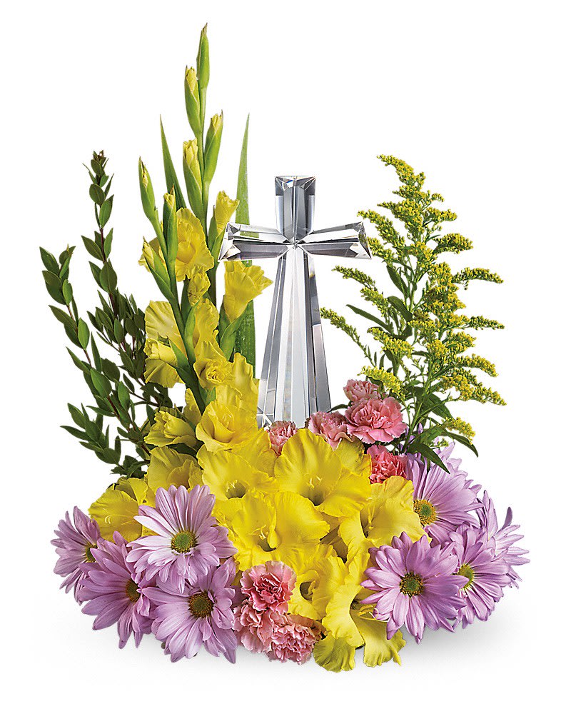 Crystal Cross Bouquet - Celebrate the reason for the season with radiant flowers cradling an exquisitely crafted Crystal Cross. This lovely gift will be a source of inspiration for years to come. Yellow gladioli, lavender daisy spray chrysanthemums, pink carnations and solidago accented with assorted greenery are delivered with a 7 Â½" high, multifaceted Crystal Cross.