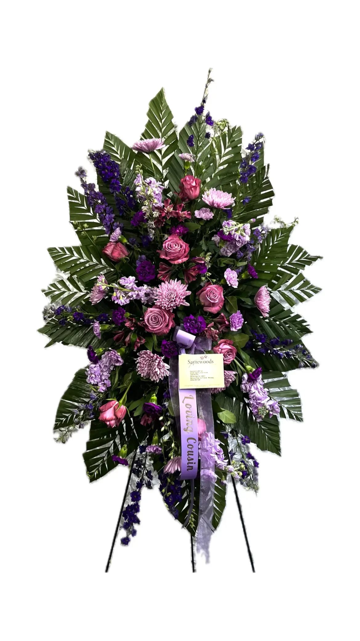 Lavender Expressions Spray - A stunning pink and lavender floral standing spray offers a heartfelt expression of compassion, beauty, and hope. This elegant arrangement speaks with simplicity and serenity, offering a perfect gesture of sincere sympathy and remembrance. An array of pink roses, chrysanthemums, carnations in shades of pink and lavender, and other blooms combine to form a touching tribute.