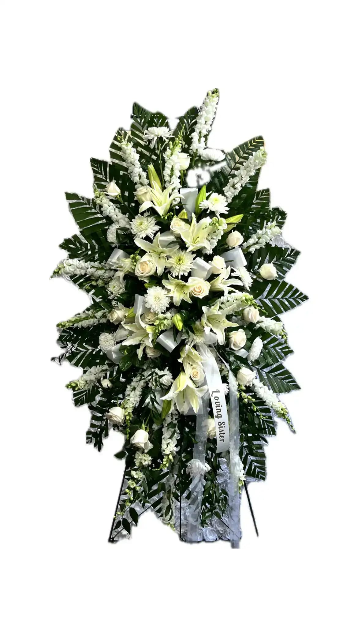 Sweet Sentiments Spray - This exquisite and elegant standing spray features a harmonious blend of white roses, lilies, carnations, chrysanthemums, and snapdragons, adorned with delicate white satin ribbon. It serves as a tasteful expression of sympathy, combining the purity of a variety of white florals. 