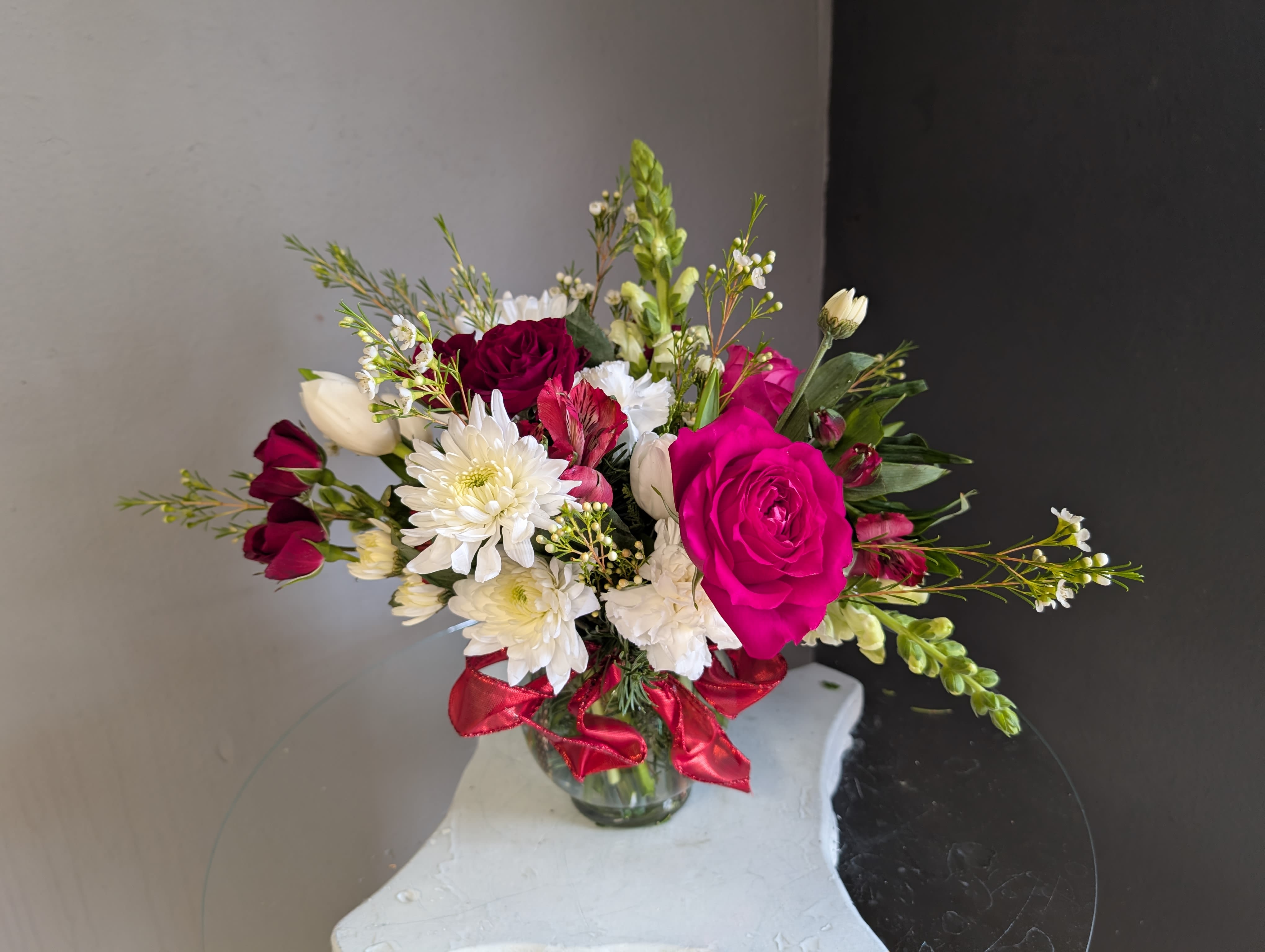 # 100 Winter Floral Arrangement - A beautifuly selected bunch of the freshest flowers in a vase uniquely arranged by hand. 