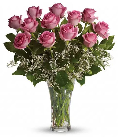 Make me Blush - Pink roses plus limonium equals an arrangement that is both feminine and sweet. Artfully arranged and sure to please.