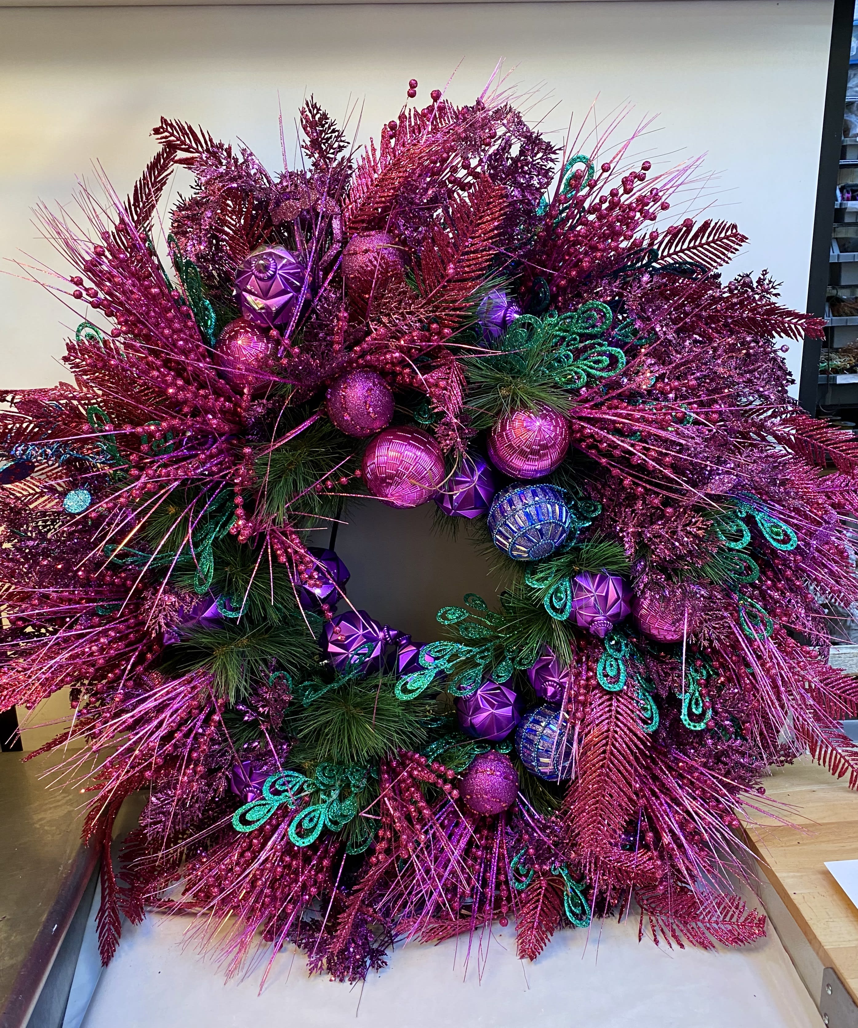 Holiday Celebration - This vibrant oversized wreath is a show stopper... the bright colors and celebratory feel will make you feel the spirit of the season.  This wreath is impressive at 45" wide.  It is a one of a kind custom design and only available as a first come first serve sale.