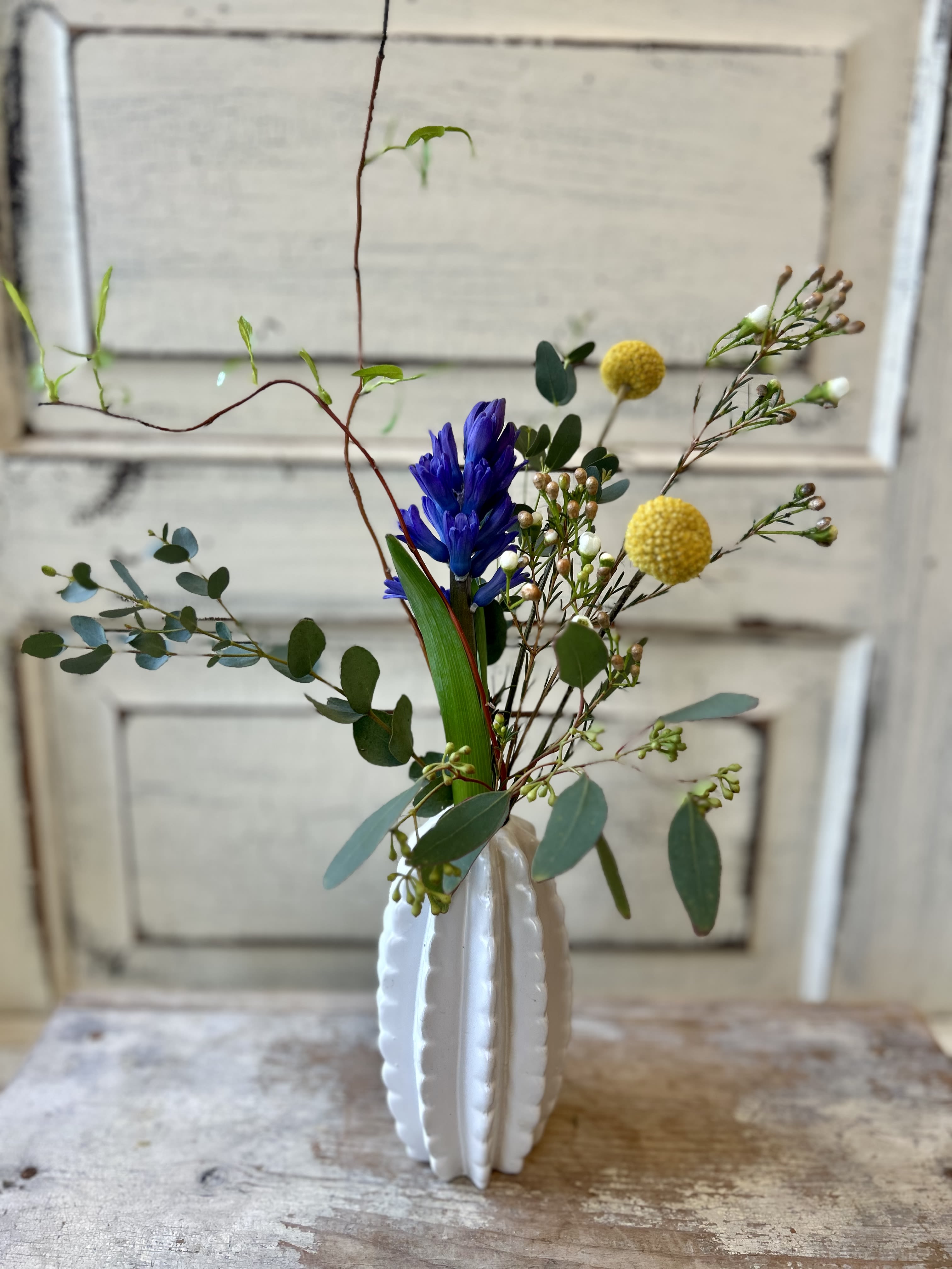 Bud Vase - A quirky cactus shaped ceramic vase holds the just right combination of blooms and foliage to make a small but impactful statement. 