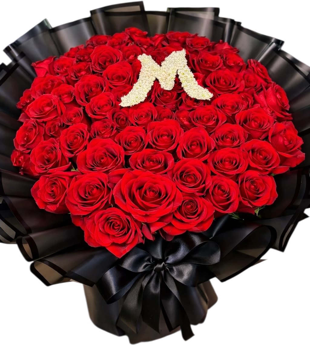 Custom Heart-Shaped Red Roses with Floral Initial - This luxurious heart-shaped bouquet is handcrafted with premium fresh red roses and personalized with a floral initial made of delicate white blooms.  Designed for proposals, anniversaries, birthdays, or unforgettable surprises, this arrangement is made to leave a lasting impression. Each bouquet is carefully crafted by our florists to ensure elegance, balance, and exceptional quality.  Perfect for those moments when ordinary flowers are simply not enough.
