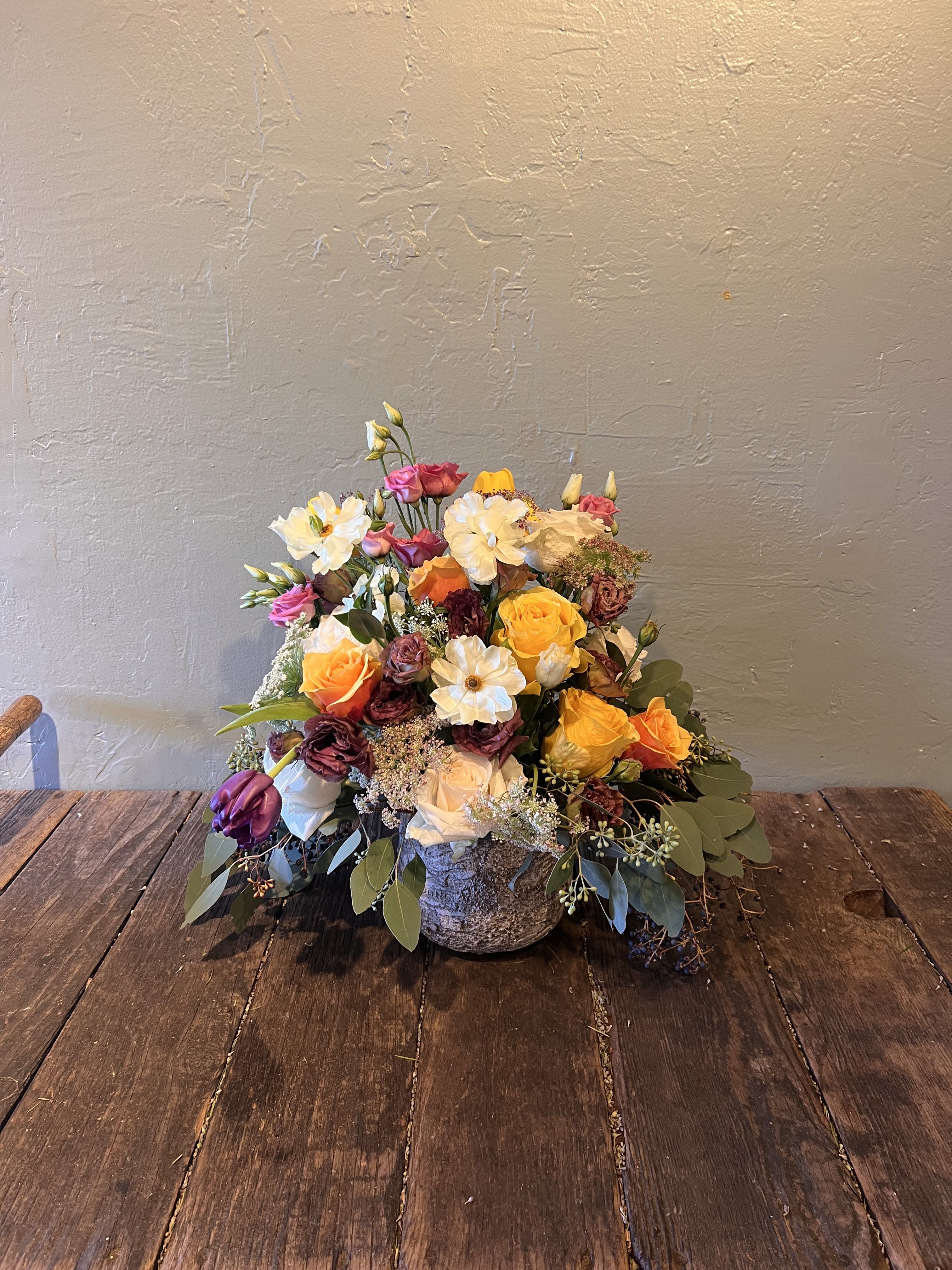 Harvest  - Inspired by the sweetness of memory and the softness of morning light. Harvest marries warm amber tones with delicate cream petals and hints of plum for depth. A luxurious, sensory design that feels like stepping into a dream — tender, opulent, and deeply romantic. 