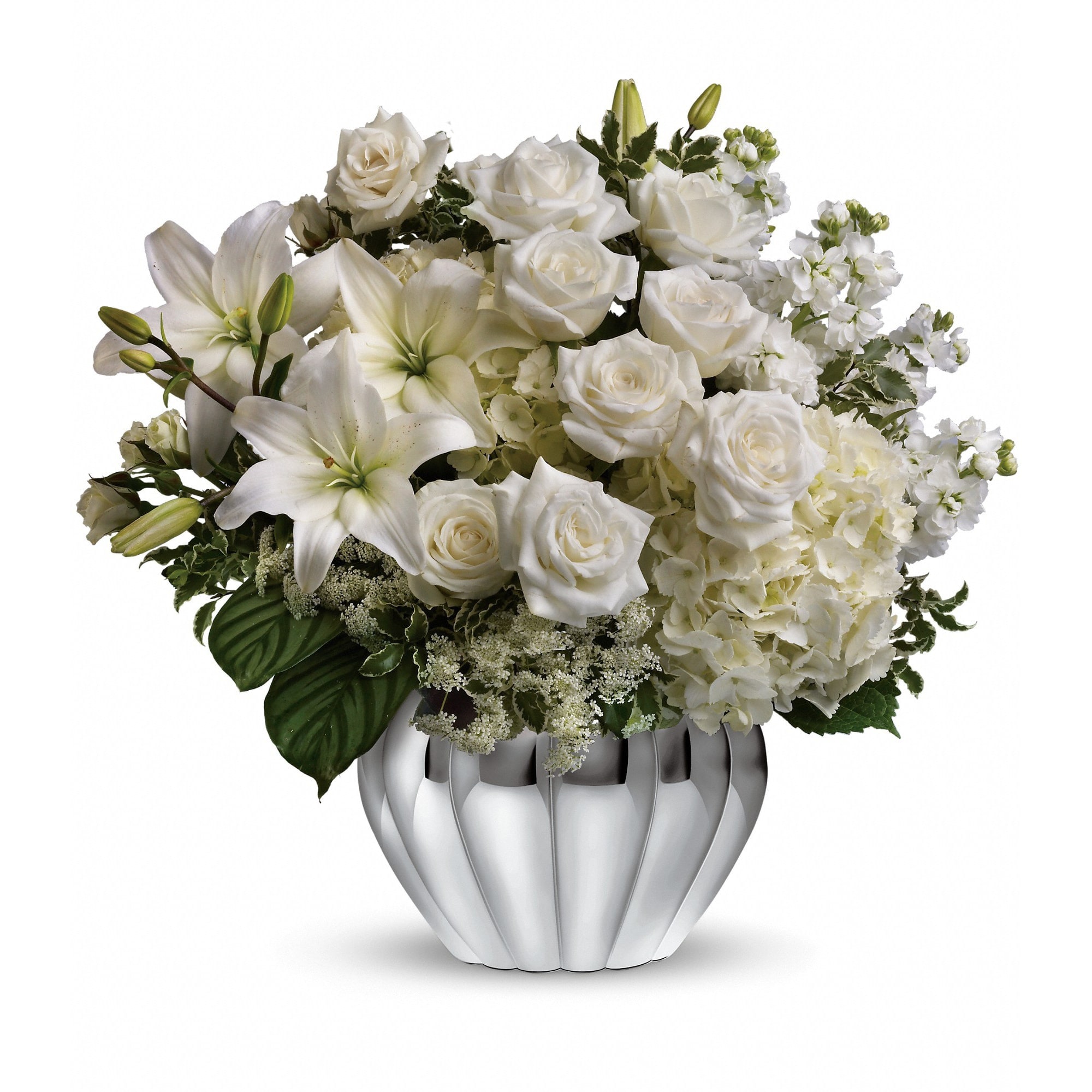 Teleflora's Gift of Grace Bouquet  - Elegantly understated, this stunning array of white roses and lilies in a stylish silver scalloped design bowl is an eloquent way to convey your love and support. 