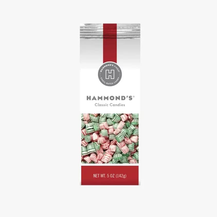 Hammond's Christmas Mints***40% OFF*** - Hammond’s Mixed Mint Pillows combine the crisp shell and creamy center of classic pillow candy with a refreshing duo of peppermint and wintergreen. Each 5 oz gift bag features festive red and green pieces that deliver a cool burst of flavor in every bite—perfect for snacking, gifting, or adding a minty touch to seasonal displays.