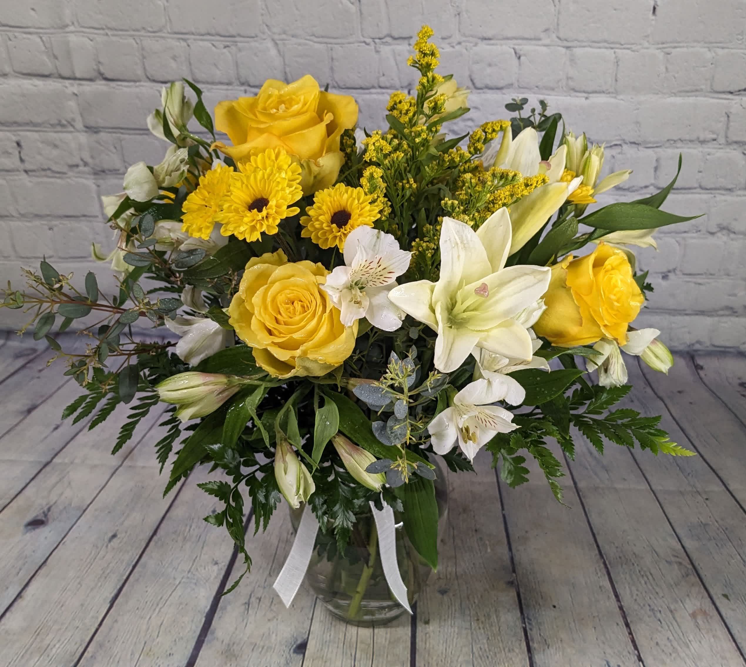 Little Miss Sunshine - Whether you need to be the sunshine for someone or you're sending to your personal ray of sunshine, this adorable bouquet will brighten any day. 
