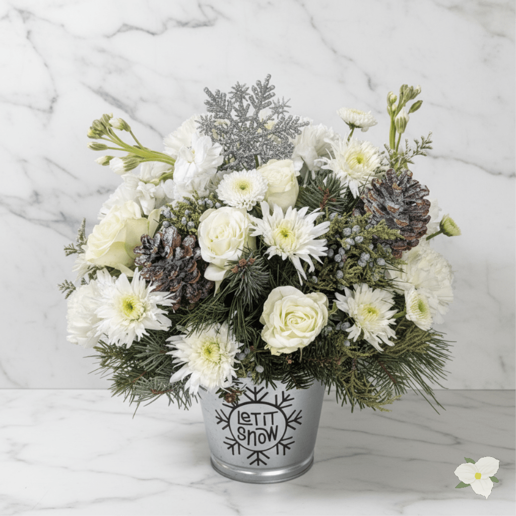Let It Snow!  - The adorable holiday bouquet is filled with pure white flowers, mixed pine, blue juniper, and snowy glittery accents. The weather might be frightful, but this bouquet is so delightful!
