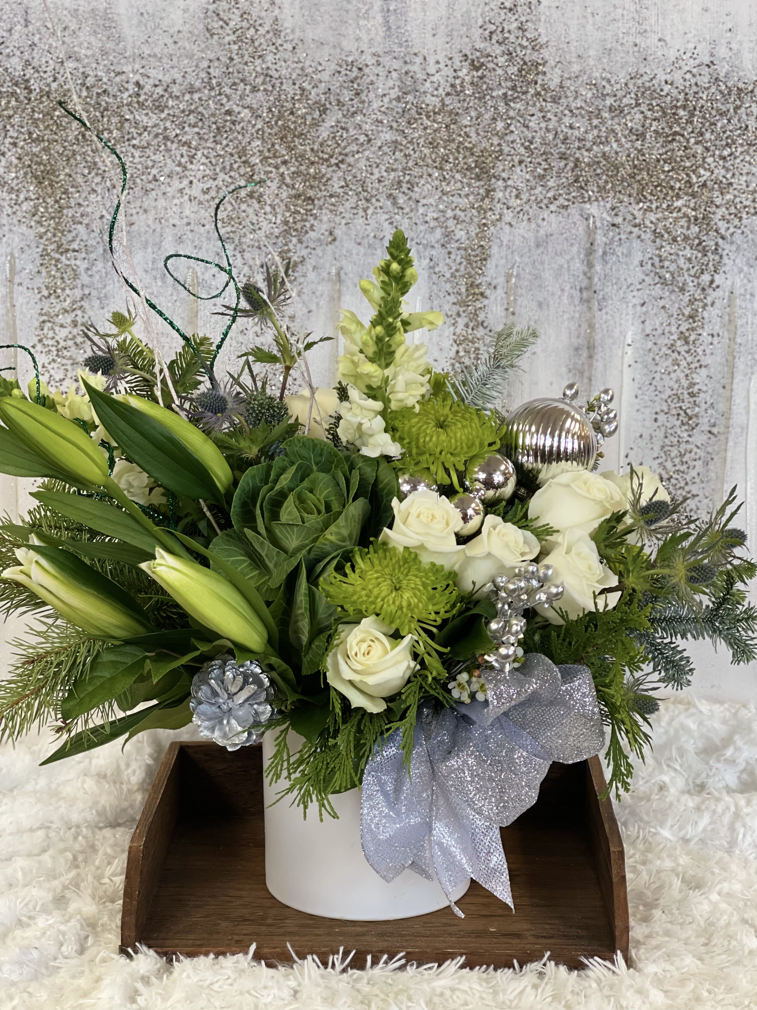 Happy New Year  - Elegant all in white and gold arrangement to enlighten the home of your loved ones. 