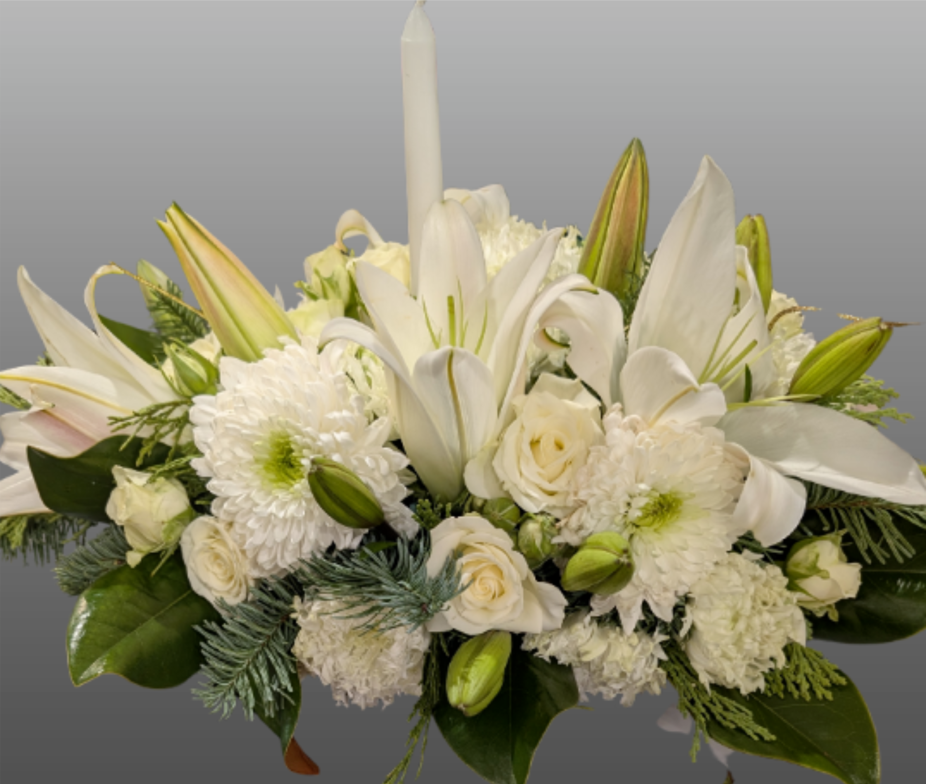 Holiday Center Piece by Season - Send a centerpiece that surprises and delights! Our floral artists will hand-select the freshest seasonal varieties to create a custom design tailored just for you.