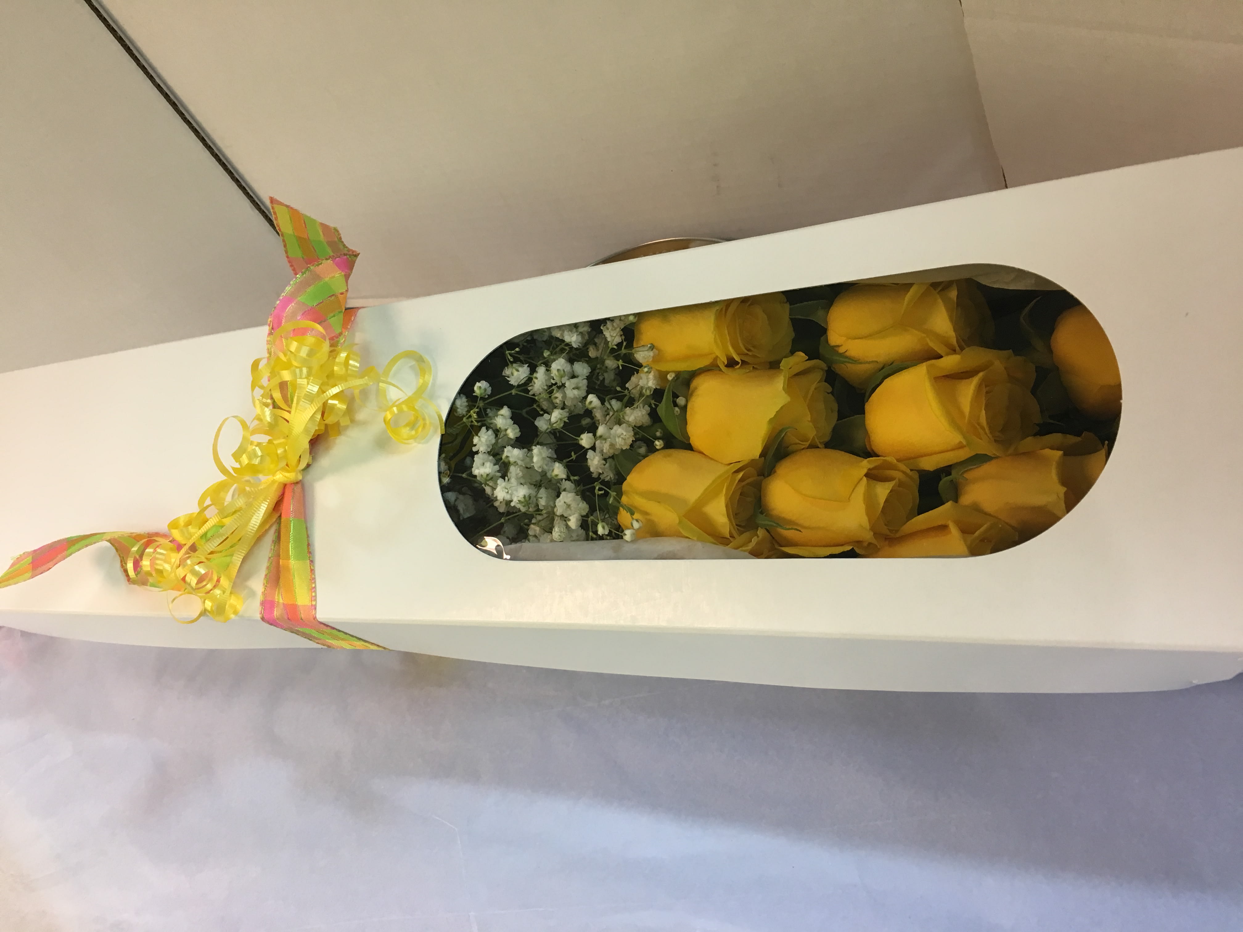 Long Stem Roses Boxed   (Call  for your Color.) - Long Stem Roses.  One Dozen Roses Boxed ,Fancy Greens.  CALL US IF YOU DESIRE A DIFFRENT COLOR THAN YELLOW. (908-234-2900) 