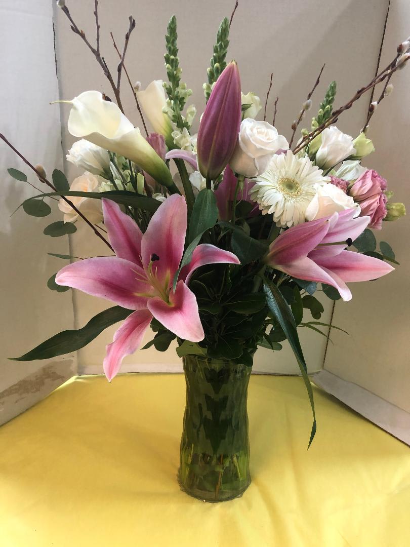 The Grand  Anniversary Floral Design  - Lilies, Roses, Gerbera Daisies, Lisianthus, Stock, Fancy Greens ,