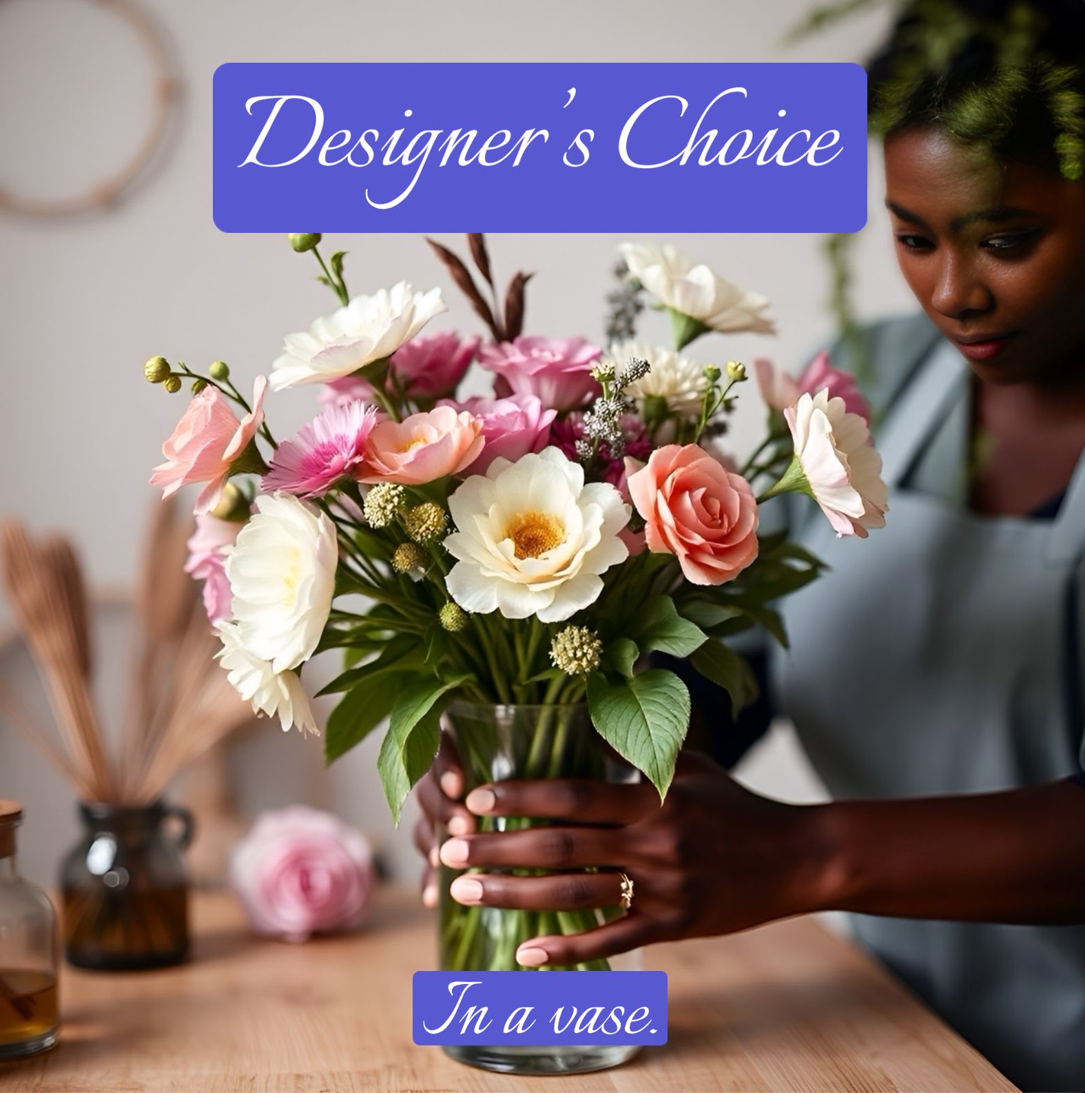 Designer’s Choice-Vase.  A Floral Archist™ original. - Vase design. Trying to guess what they’ll like? Which colors, textures, or aromas complement each other? Is this a joyous, sad or proud moment? Just leave it to us, our Seasoned Designers with over 18 years of experience, have learned to understand our flowers and foliage ... flowers that love their ‘roommates‘ (other cut flowers) and those who want nothing to do with them. The final product will for sure, please everyone!     Definitely Male Appropriate.  Container, fresh blooms, greenery custom designed in water.  NOTE: Our flowers and greens are a gift from nature. It’s shade and depth might vary, design, aesthetic and value remains the same. In support of our efforts to aide in the preservation of our planet, PJf uses Fair Trade flowers, Plants, Upcycled and Recycled containers.  