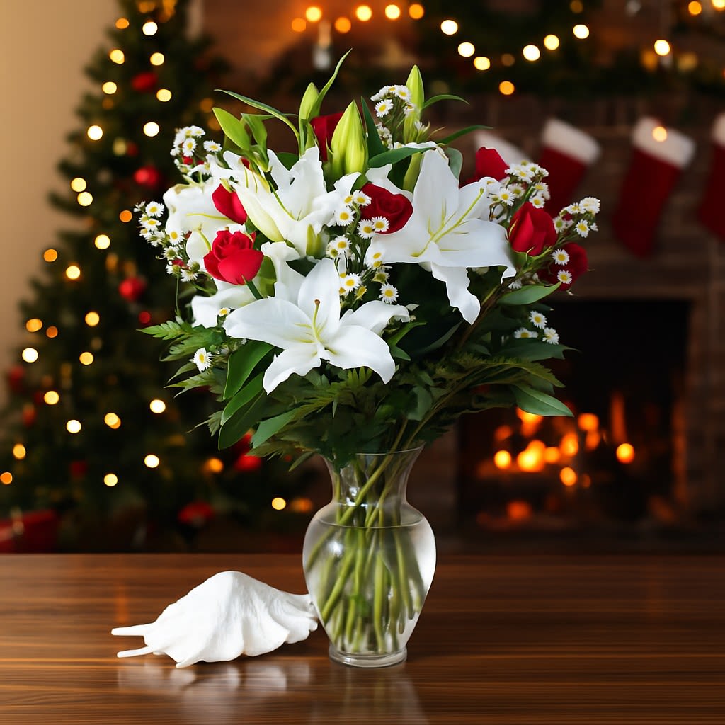 New Year's Romance  - Timeless Romance New Year's Edition  Elegant Floral Selection: Features premium red and white roses paired with stunning white Stargazer lilies for a romantic and sophisticated look.  Festive New Year's accents Impressive Size: Standing approximately 27" tall and 22" wide, this arrangement is perfectly sized to be a striking centerpiece or decor piece.  Perfect for Gifting or Decor: An ideal choice for expressing holiday romance, whether as a thoughtful gift or an elegant addition to holiday decor.  Classic and Refined: Designed to impress with its timeless elegance and romantic color palette, making it a memorable holiday arrangement.  Celebrate the season with the Christmas edition of our Timeless Romance arrangement, blending classic beauty with festive charm.