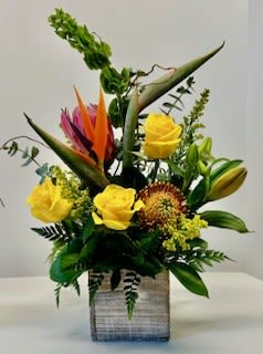 Tropical Shorty - Wooden box with a few tropicals and roses.