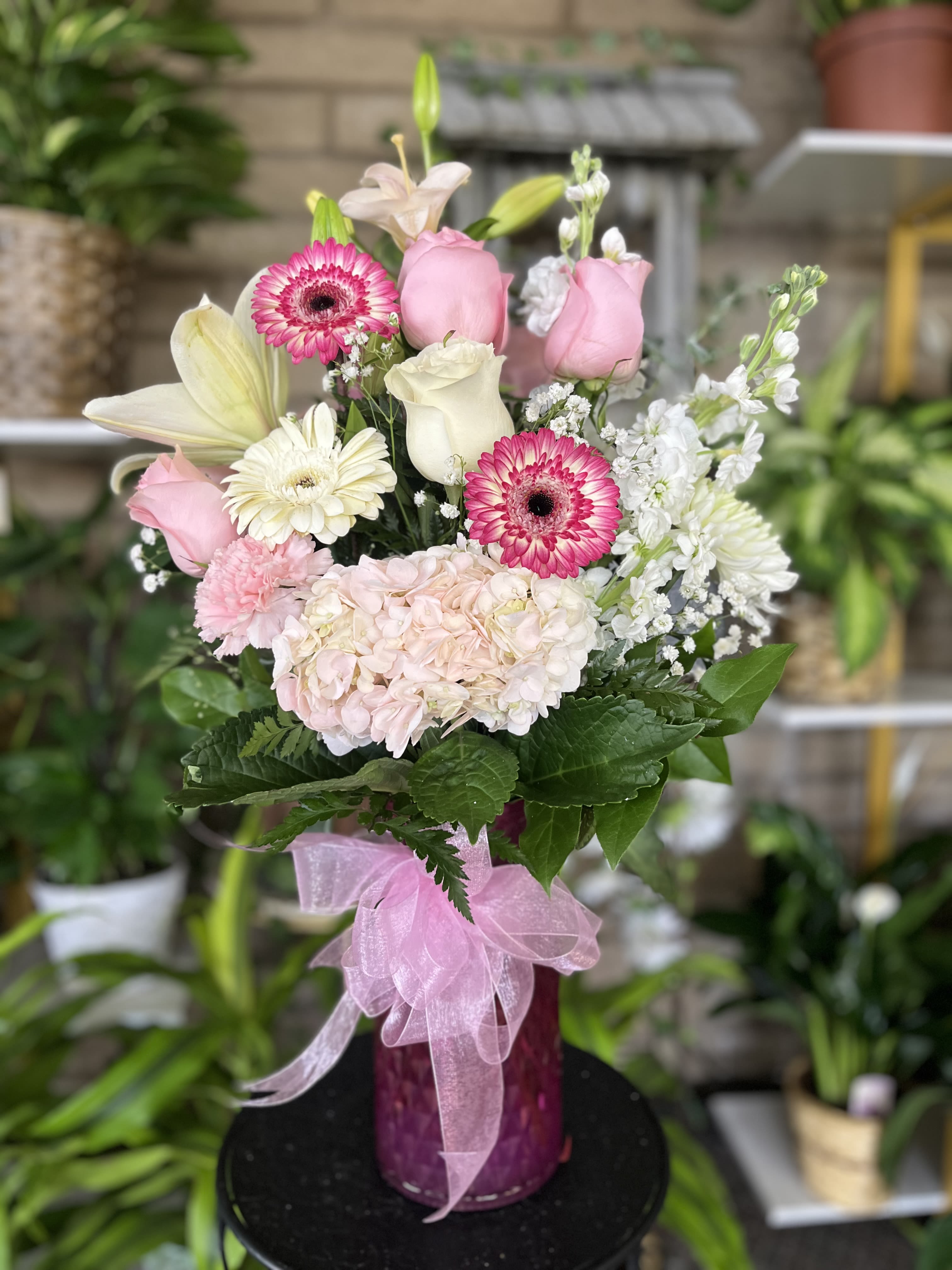 Pink Love  - fresh flowers in large hot pink floral vase 