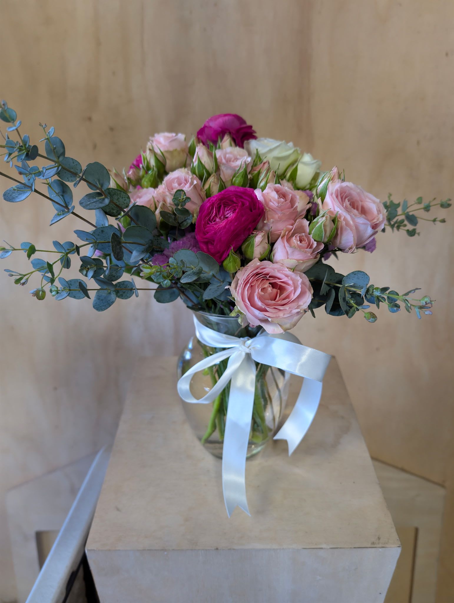 Simple Yet Ranunculus - Simple is sometimes the way to go! But we threw some Ranunculus in this one because you're loved ones will love them. Fit for any occasion, this one will be a pleaser.   Gorgeous Spray Roses and of course Ranunculus! Simple. 