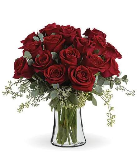 Forever Beloved - Forever beloved. Forever in your heart. Forever close to you. That is what this beautiful rose arrangement symbolizes. A shared life. Or a shared sacred moment.  All will be dignified beautifully with this loving gift of roses in a classic vase.  Red roses are arranged with beautiful eucalyptus and a lovely vase. Say it with flowers, when no words will speak the feelings in your heart.  Orientation: All-Around