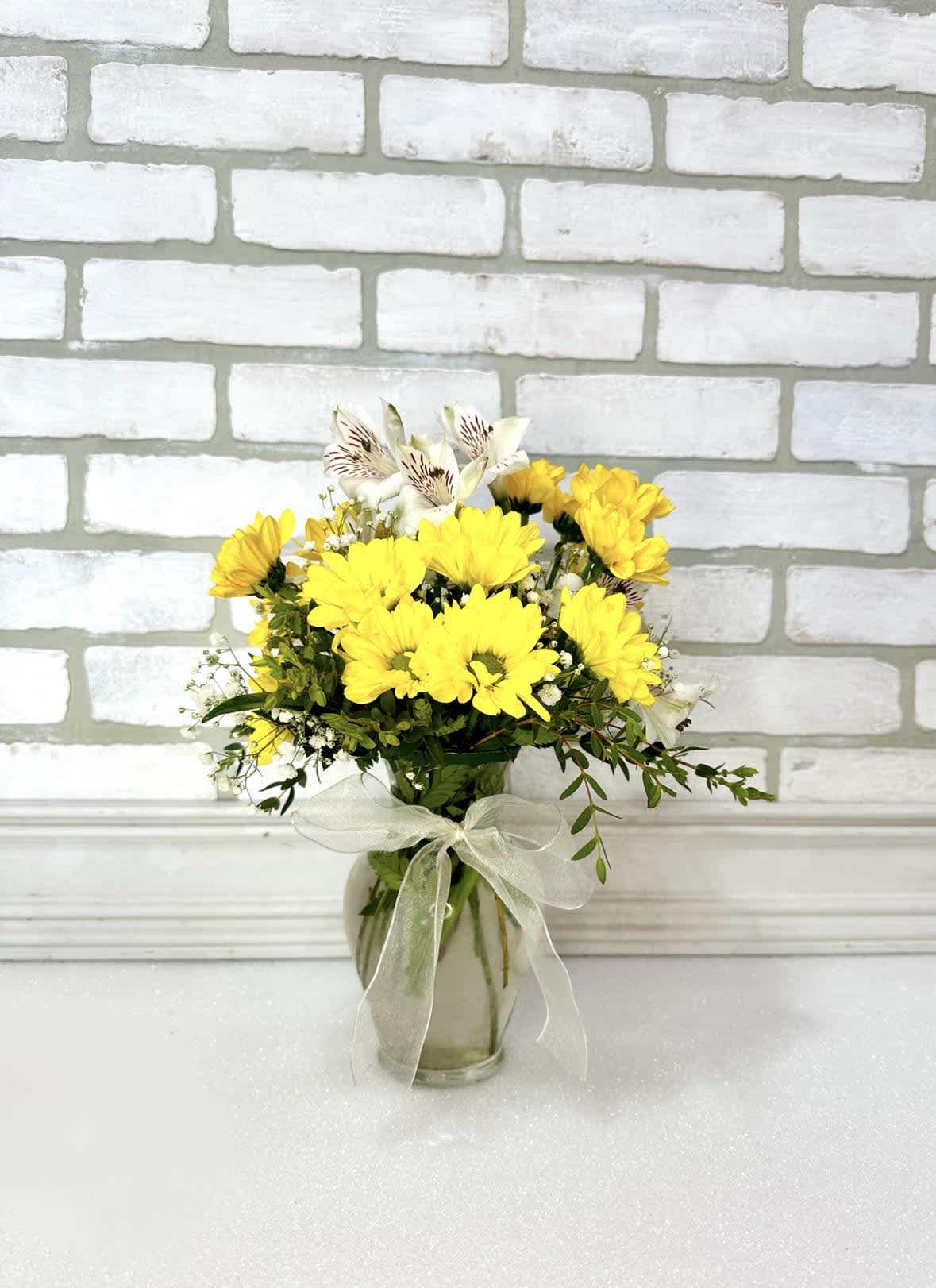 Ray of Sunshine - A petite display of yellow daisies and white alstroemeria.