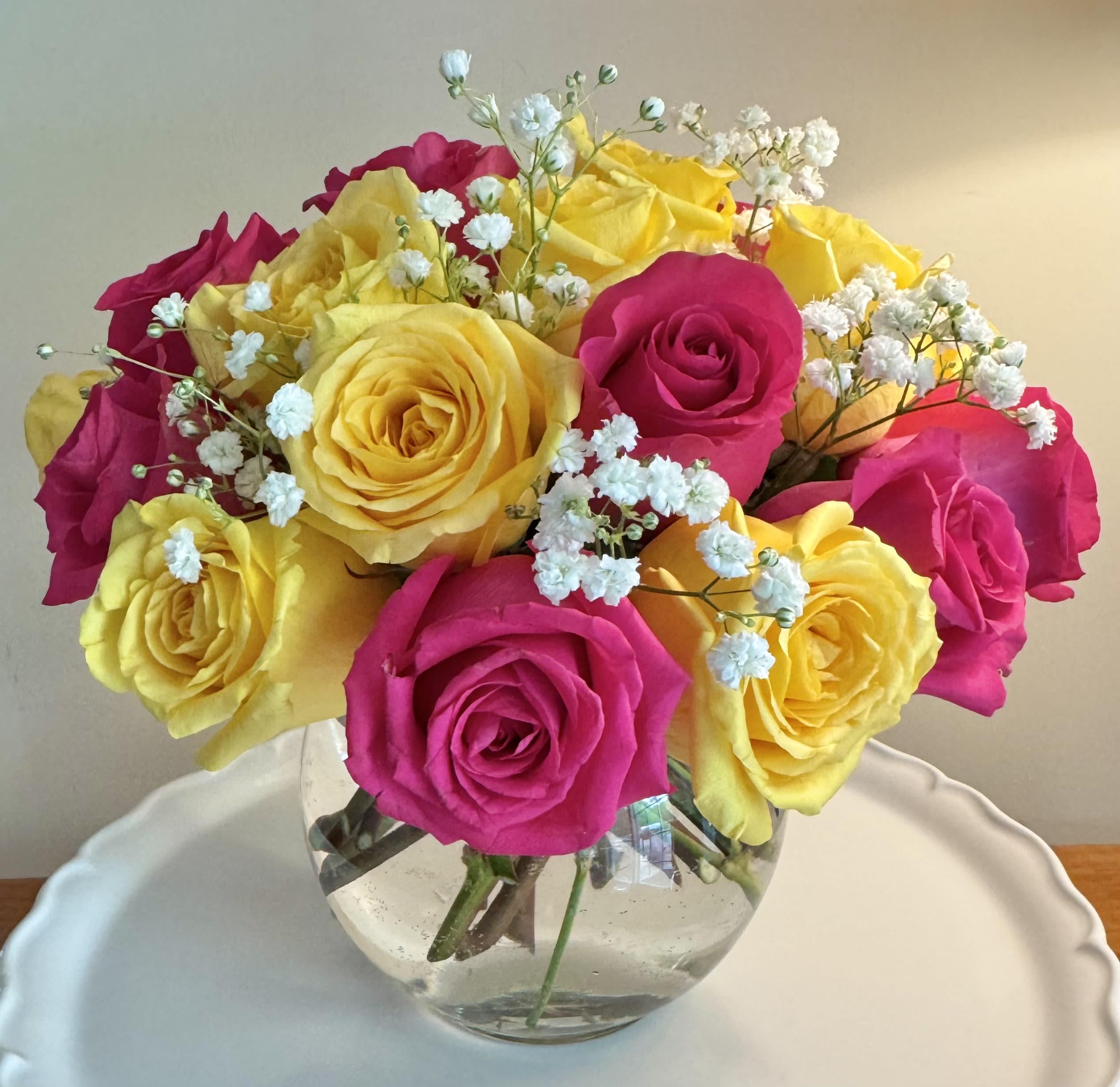 Daybreak by Petal-ful Blooms - A lovely bowl of 24 colorful roses and filler brightens and lifts any room (and relationship!) A great gift for sending on Mother's Day, Valentine's Day, Birthday or just because, to your significant other, your friend, or your mom!  Deluxe shown in pics and recommended.   Approximate Dimensions: 8”D x 8”H