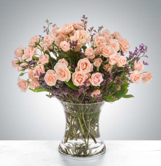 Rose Gold by BloomNation™ - A chic twist on sending somebody the classic dozen, spray roses are a great way to say you care in a lot of ways. Send blush spray roses for Breast Cancer Awareness Month, International Women's Day, or just because.  1st Image: Standard 2nd Image: Premium