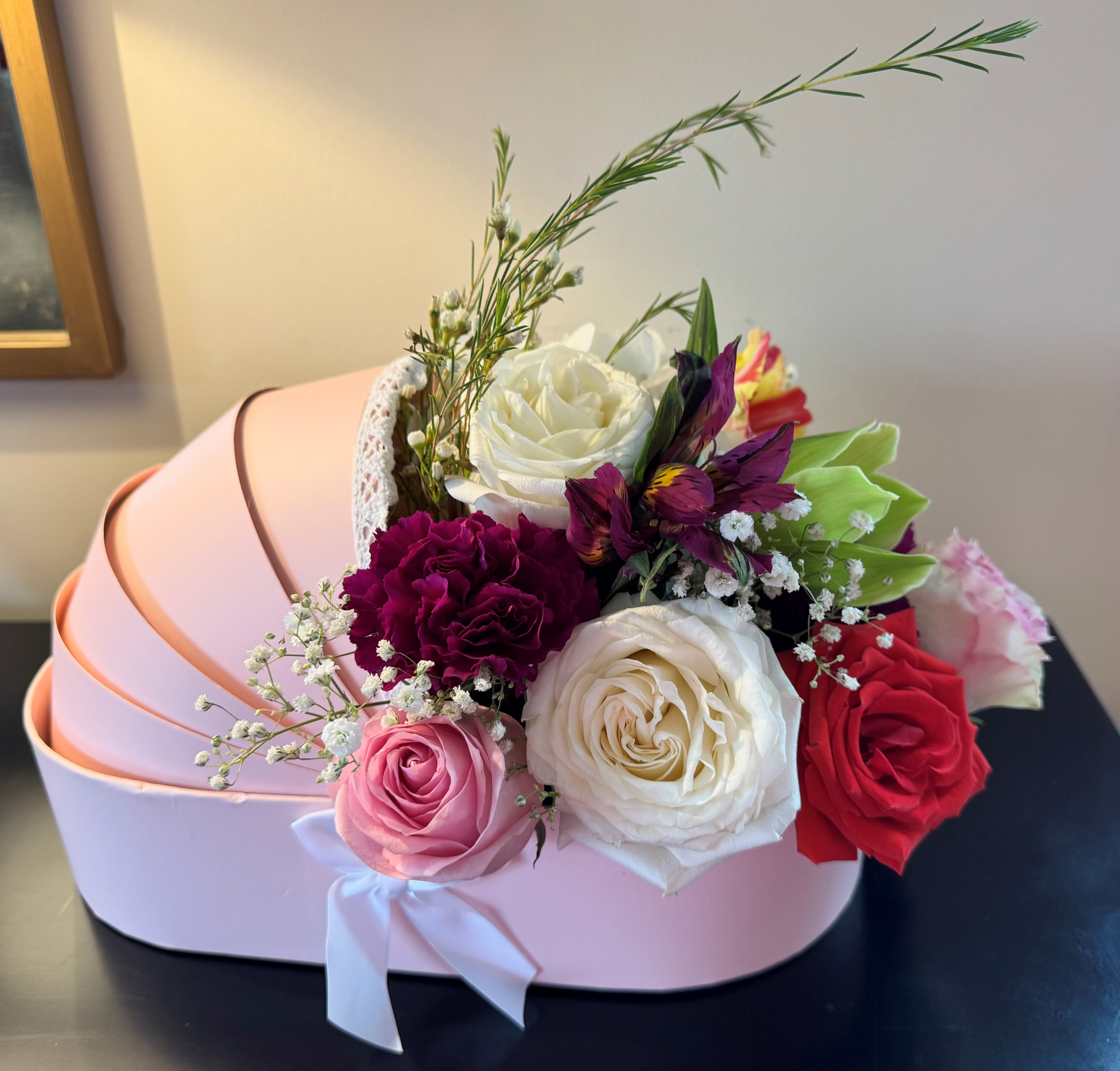 Cradle Flower Box - Fresh seasonal flowers in a cradle flower box to celebrate the new baby girl or boy!