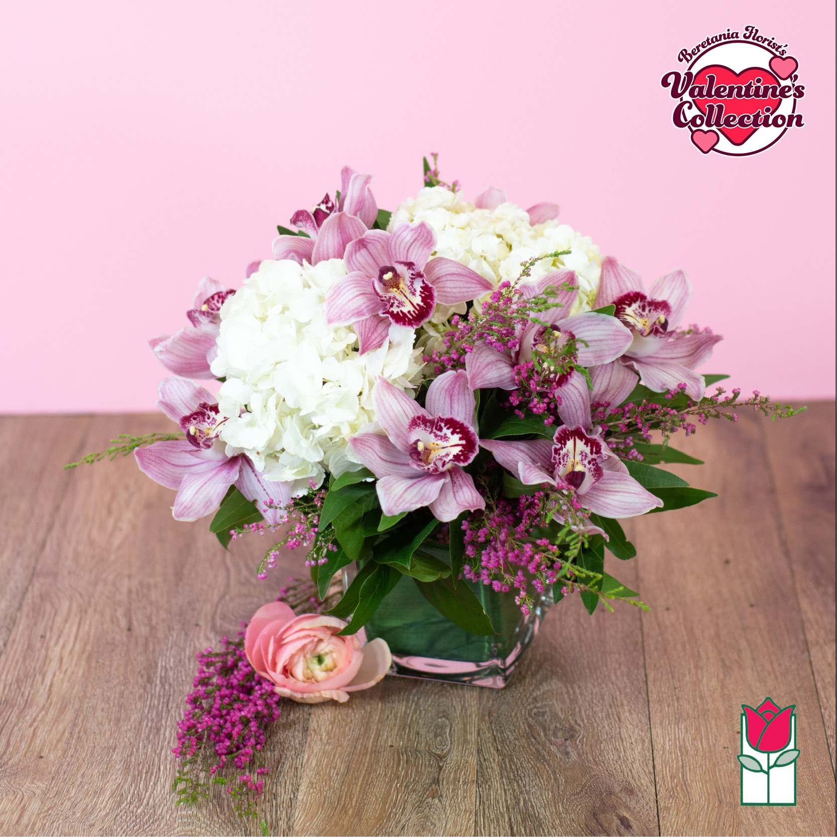 Beretania's Ocean Villa Tropical Bouquet (Seasonal Varieties Vary) - Approx. size: 8" High x 8" Wide  The Beretania Florist Ocean Villa bouquet is a stunning and elegant floral arrangement that is perfect for any occasion. This beautiful bouquet is crafted with care using premium quality pink cymbidium orchids, white hydrangea, and other seasonal mixed garden flowers.  The 4" glass cube vase adds a touch of sophistication and style to this already gorgeous bouquet, making it a perfect gift for someone special or a stunning addition to any room in your home or office.  This popular item is now available for delivery in the Honolulu area, making it easy and convenient to brighten someone's day or add a pop of color and beauty to your own space.  Whether you're looking to celebrate a special occasion, say thank you, or simply brighten someone's day, the Beretania Florist Ocean Villa bouquet is the perfect choice. Order now and let the beauty of these exquisite flowers speak for themselves.
