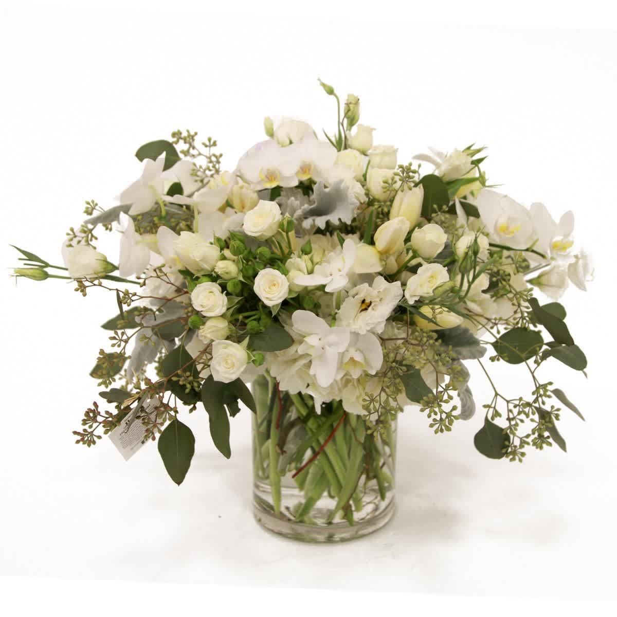 Alluring Elegance Bouquet - ceramic vase arrangement featiromg all white and creams and ivory, roses, hydrangea, spray roses and lisianthus with eucalyptus