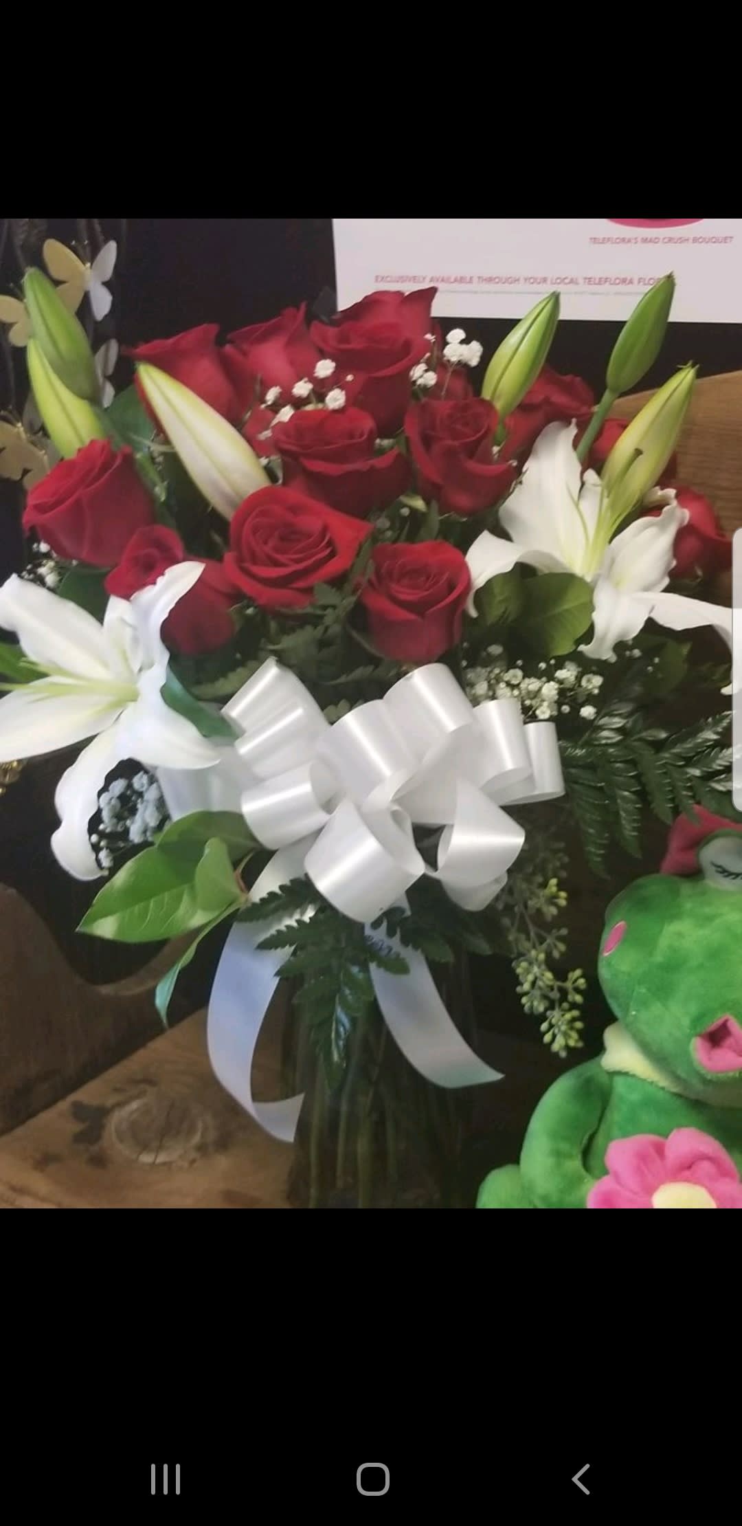 "YOU KNOW I LOVE YOU" (standard comes with 1 dz roses and white casa blanca lilies - Vase of fragrant white lilies and red roses for that special one...   So elegant and beautiful she will already know...…..(you sent them) **card message is included but not needed  ;)